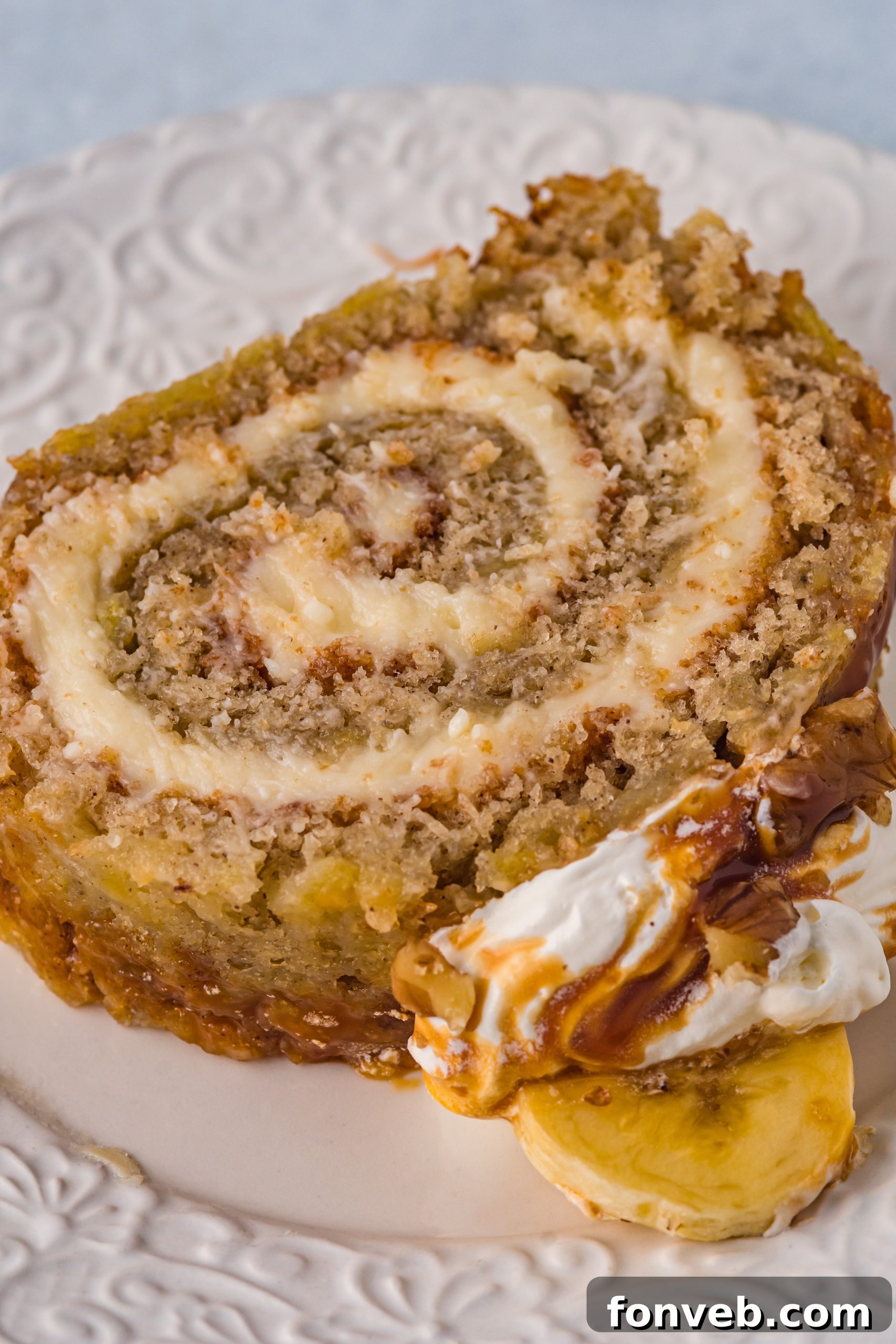 The last shot of the banana cake roll, inviting viewers to try the recipe