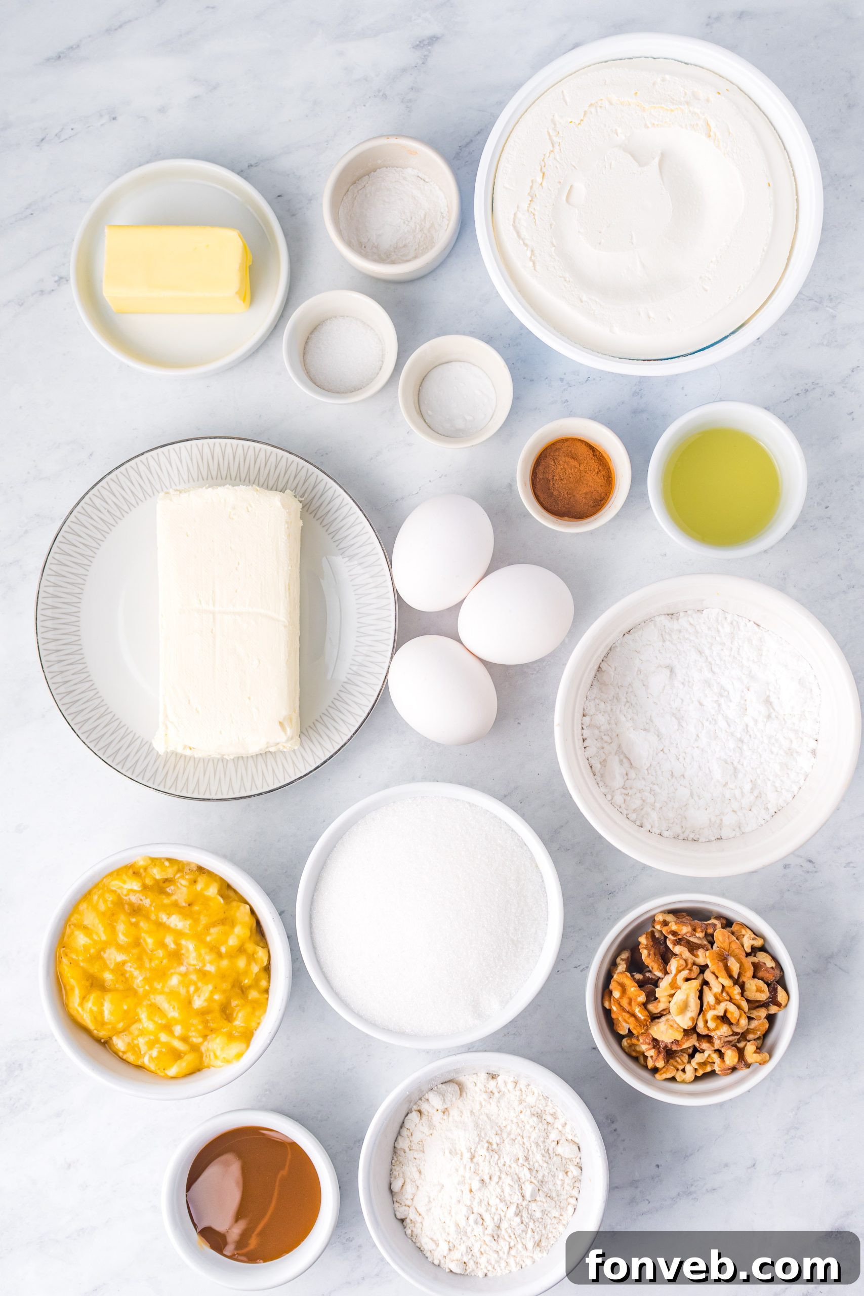 Banana Cake Roll with cream cheese filling and caramel topping on a cooling rack