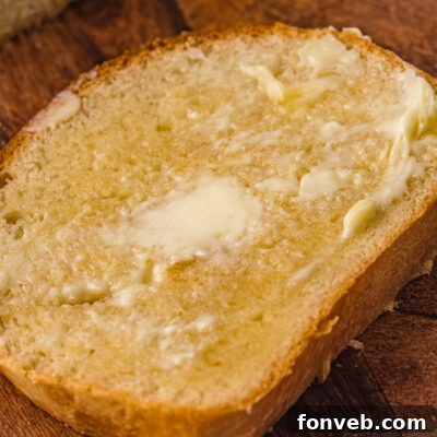 A beautiful, freshly baked loaf of Amish White Bread.