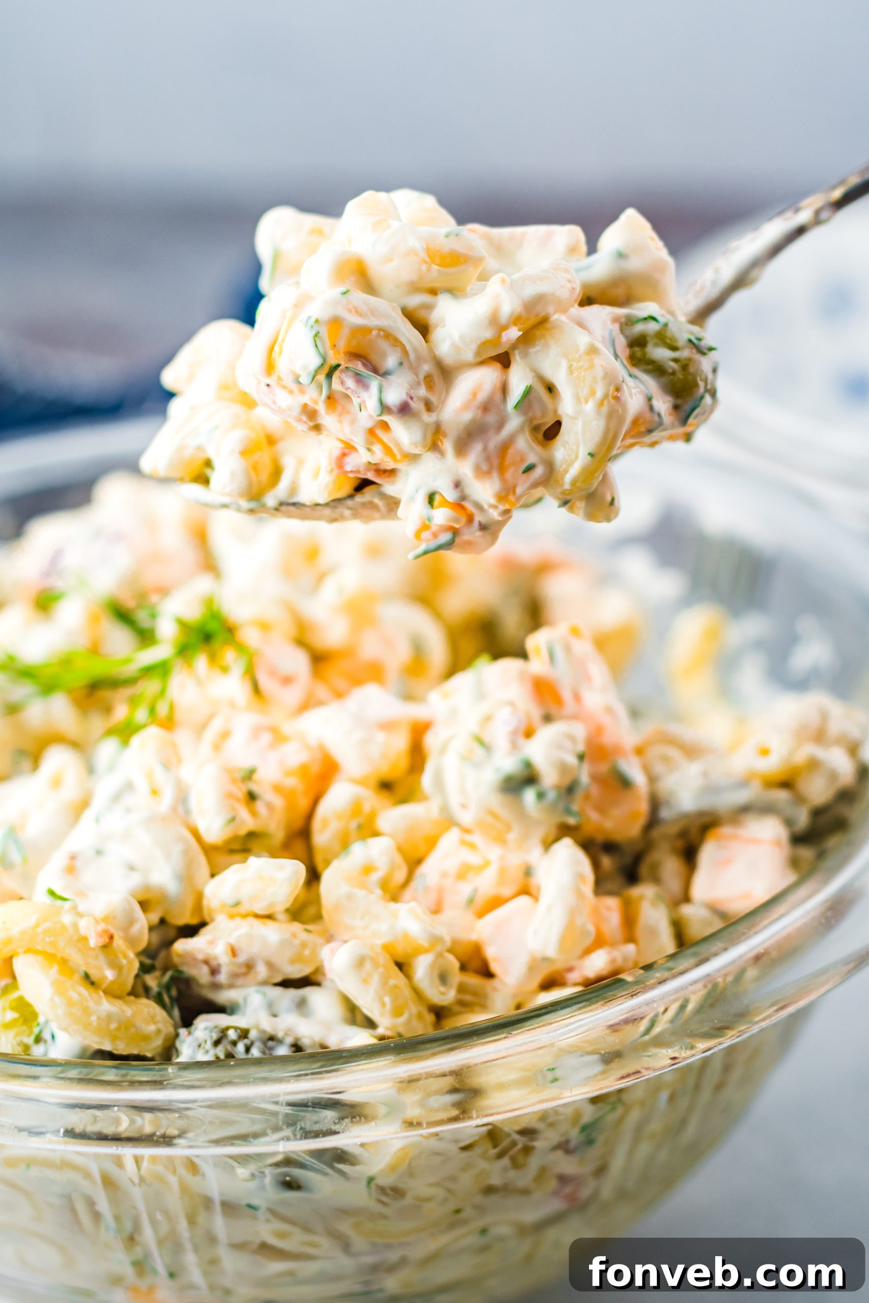 Dill Pickle Pasta Salad with fresh dill garnish, perfectly capturing its vibrant and appetizing appearance.