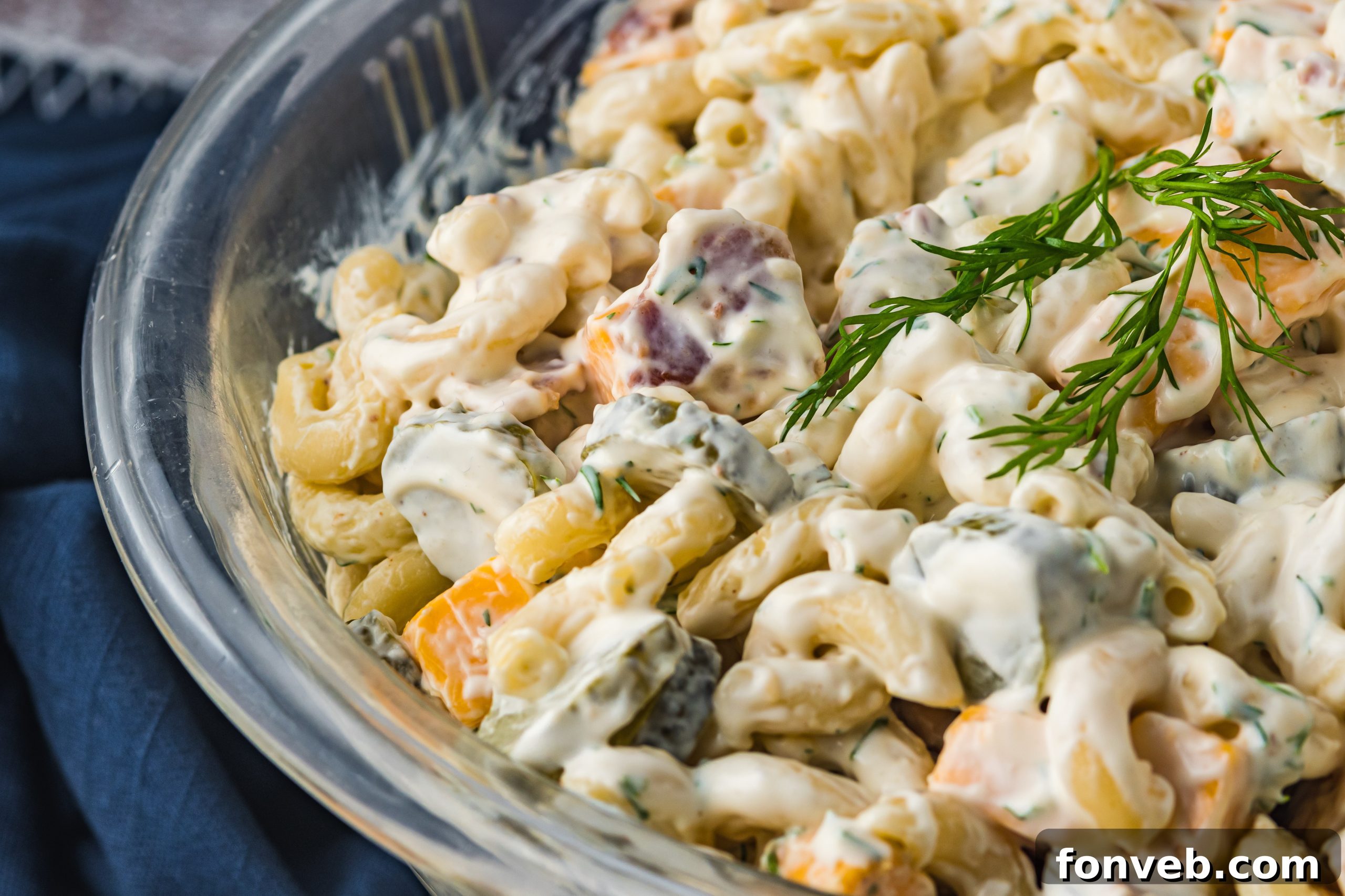 An inviting overhead shot of a large bowl of Dill Pickle Pasta Salad, perfect for sharing at any gathering.