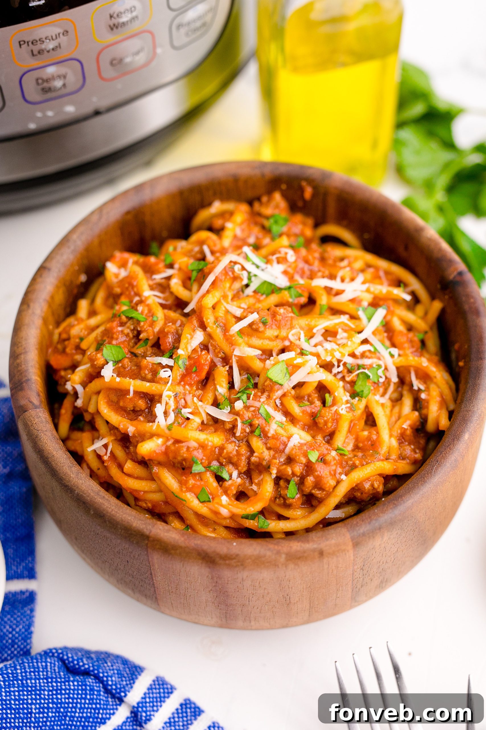 Instant Pot Spaghetti in a wooden bowl overhead shot