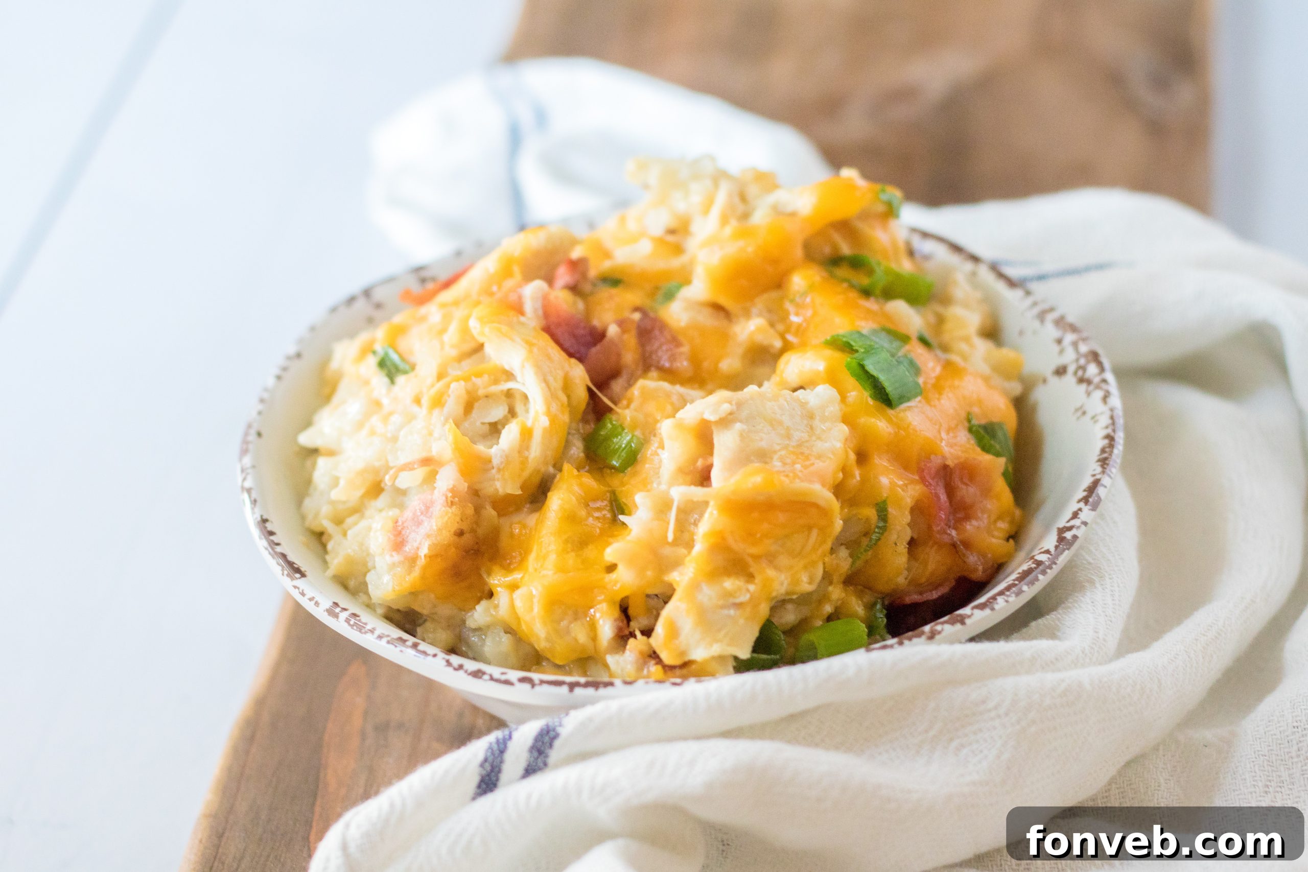 Tater Tot Casserole with chicken in a bowl, ready to serve