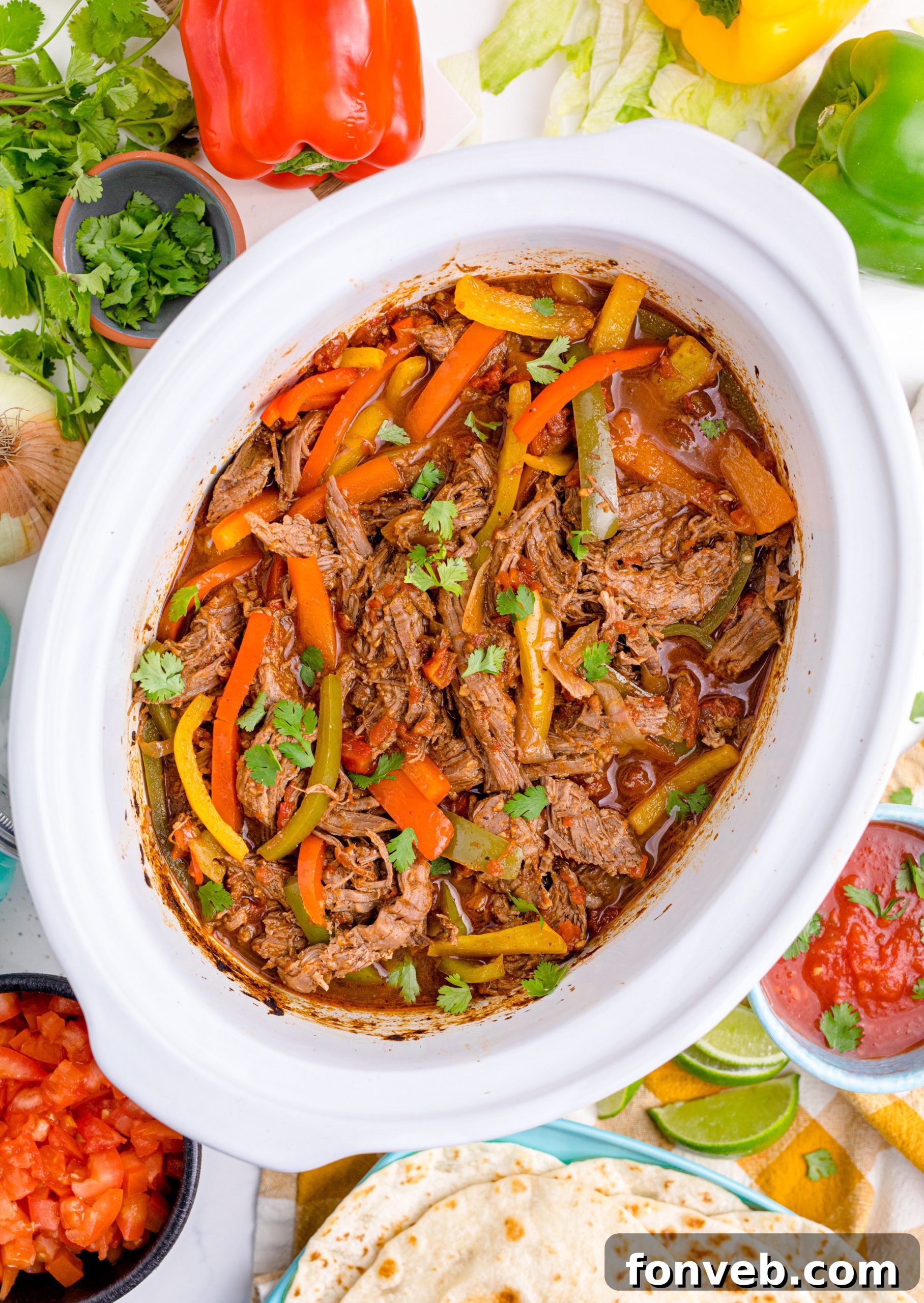 Steak Fajitas in a white crock pot