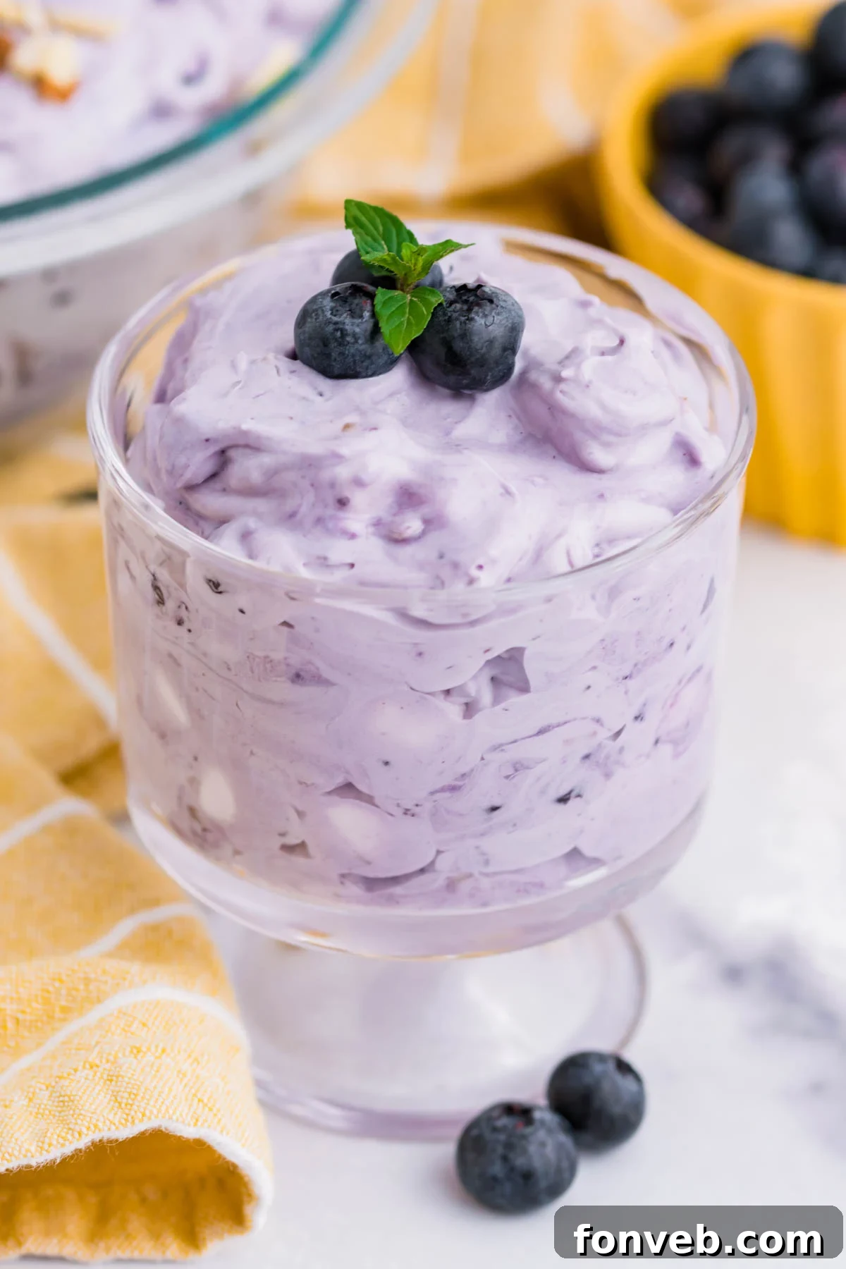 Blueberry Fluff Salad in a clear glass mini trifle