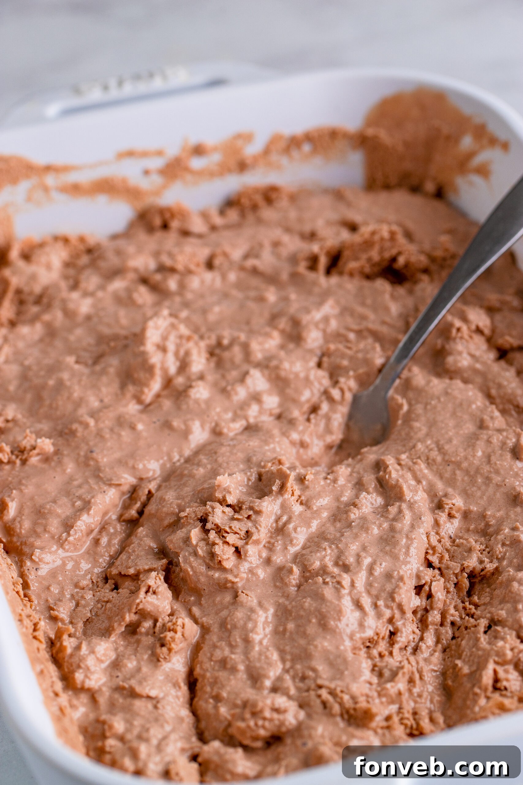 Homemade Wendy's Frosty chilling in a white baking dish, ready for freezing