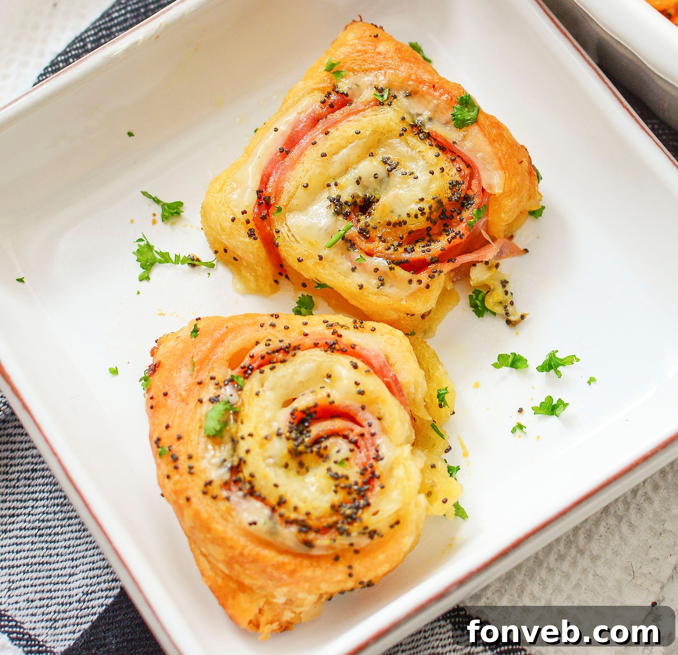 Ham and Cheese Pinwheels on a white square plate