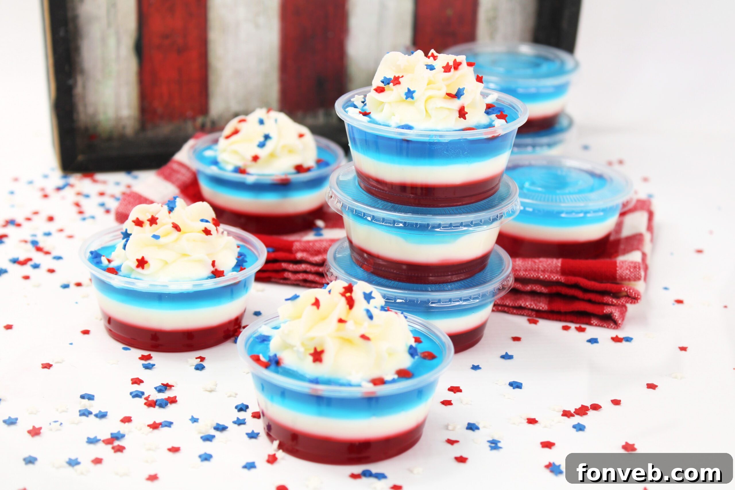Bomb Pop Jello Shot layered red, white & blue in a bunch