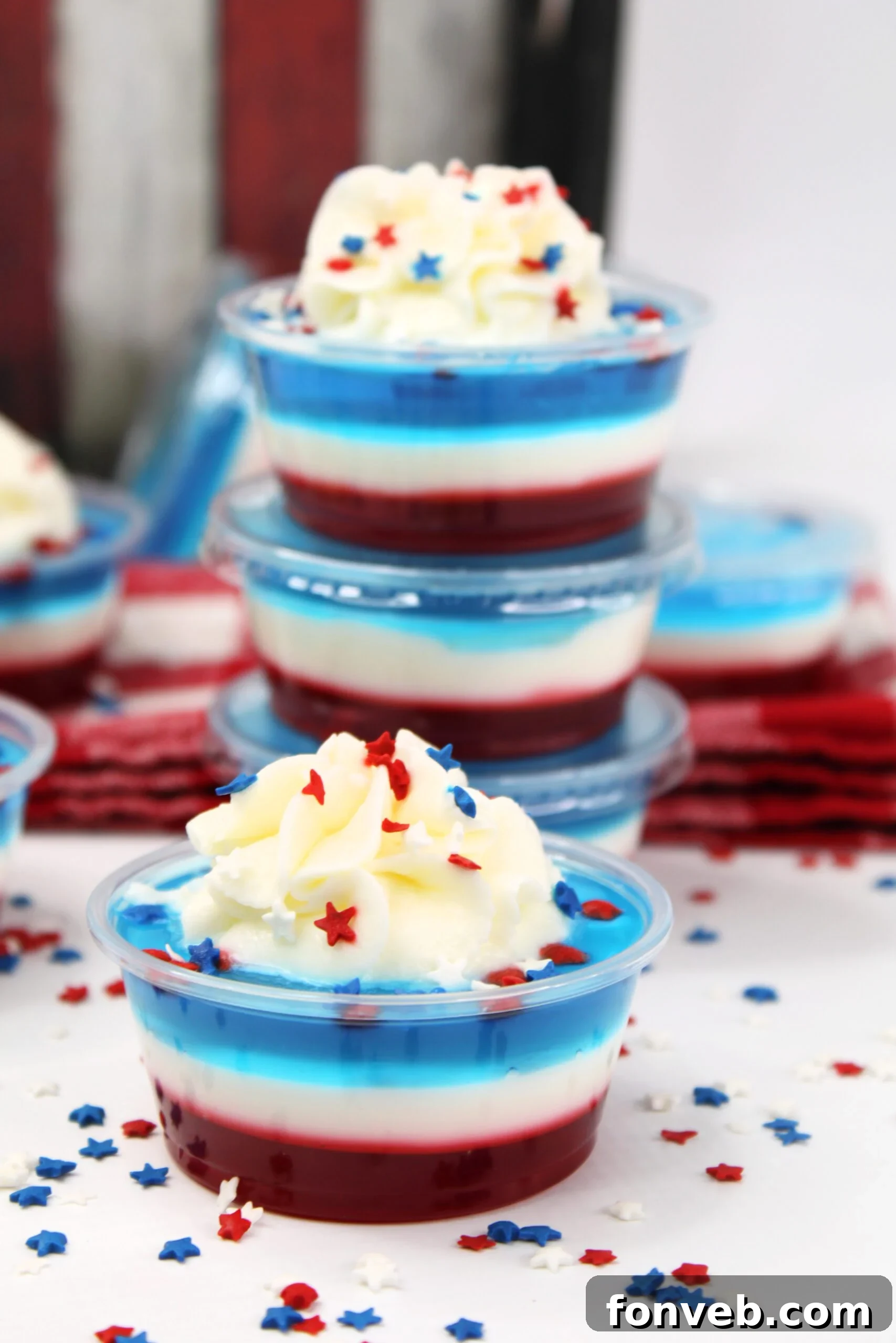 Bomb Pop Jello Shot layered red, white & blue stacked