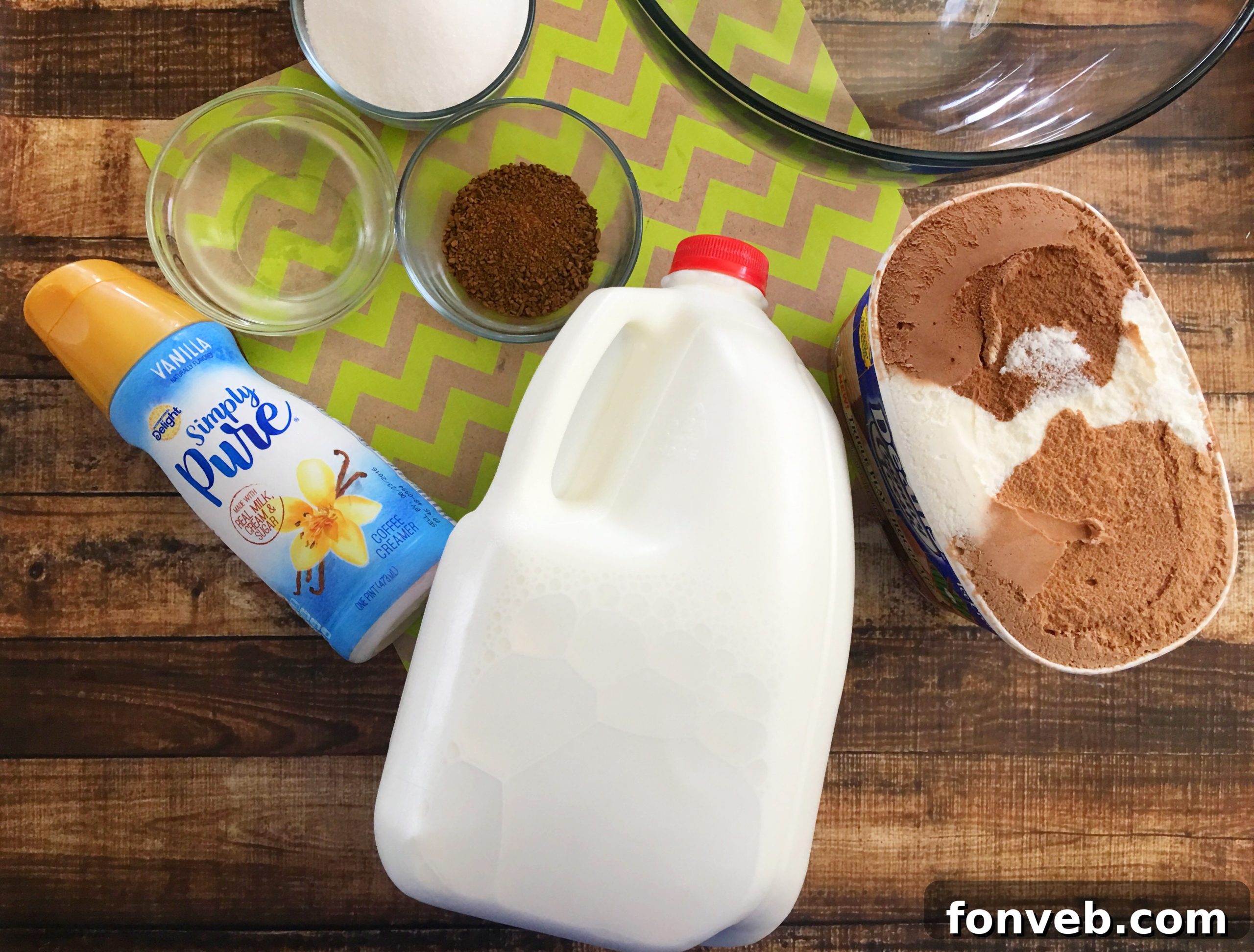 A large punch bowl filled with a creamy coffee punch