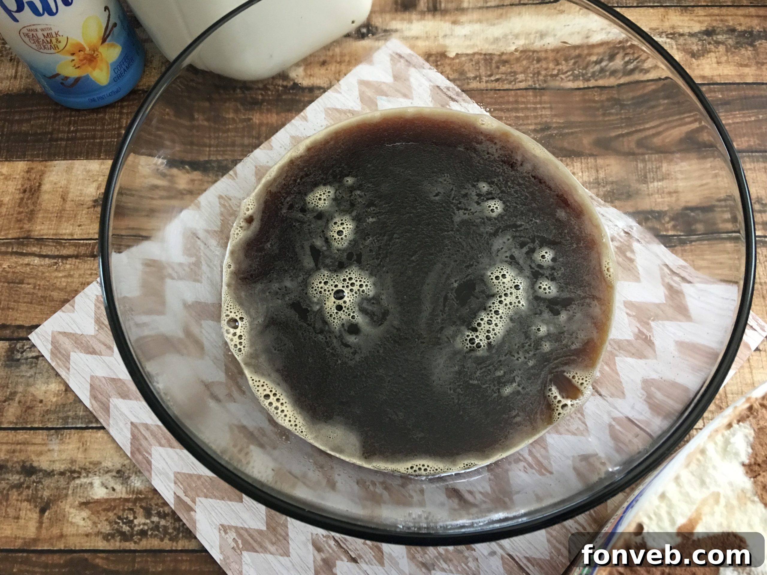 A close-up of coffee punch with a scoop of melting ice cream
