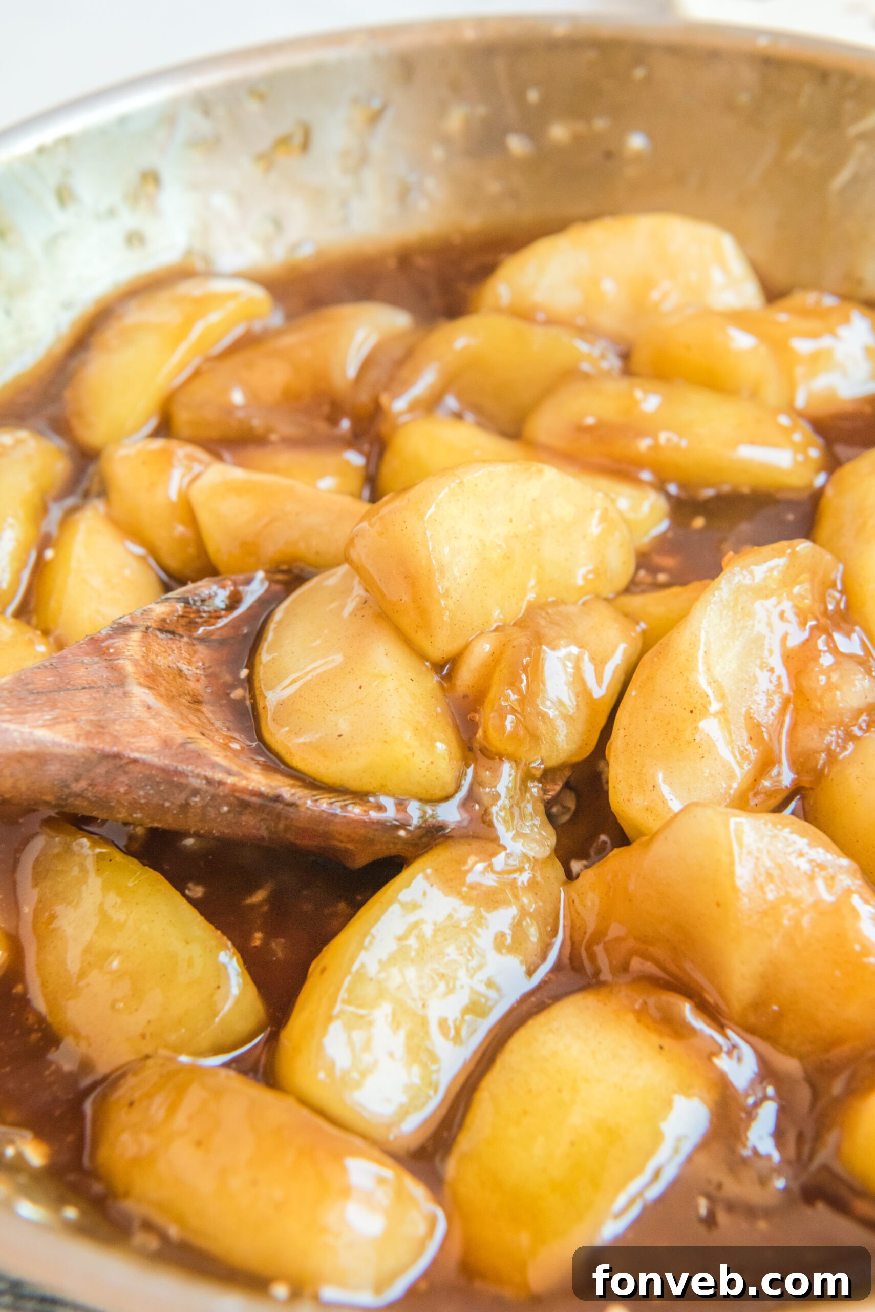 Caramelized apples in a steel pan