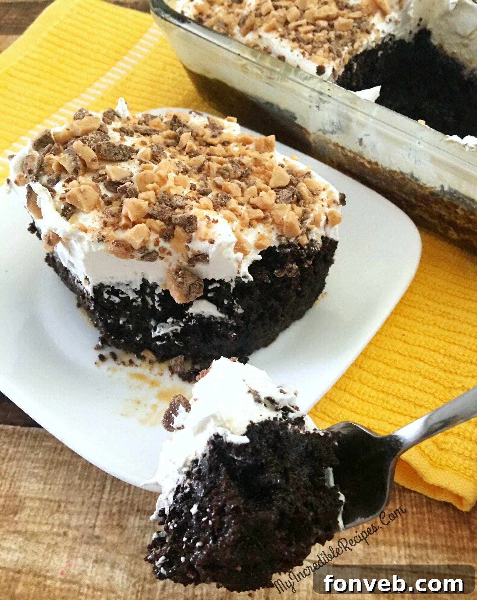 Sweetened condensed milk being mixed with caramel sauce