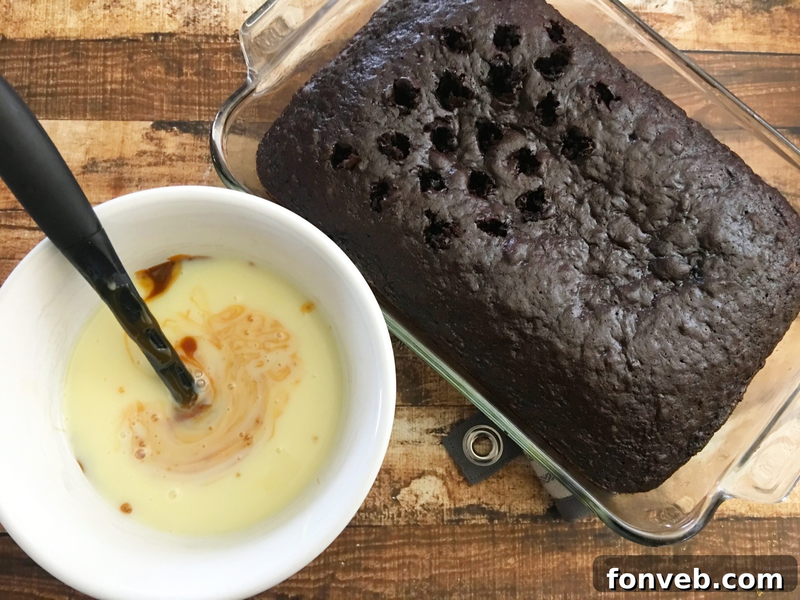 Baked chocolate cake cooling in a pan