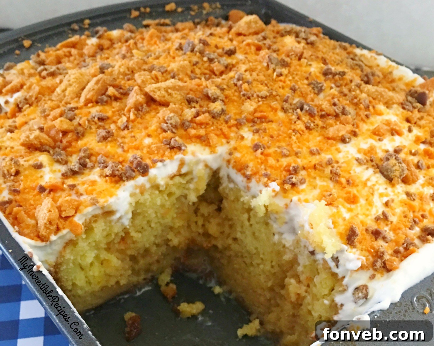 Another mouth-watering shot of a slice of the moist Butterfinger cake, emphasizing its tempting layers.