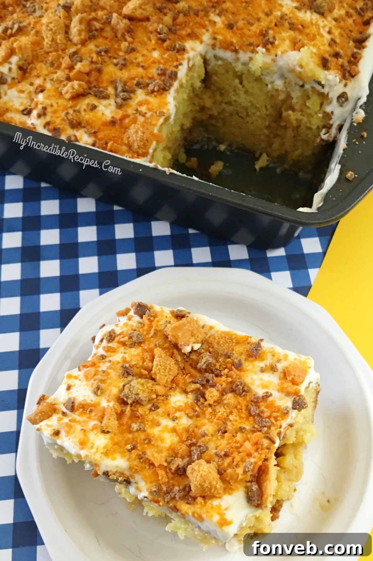 A delectable slice of Butterfinger Extasy Cake with visible layers and crushed candy, ready to be enjoyed.