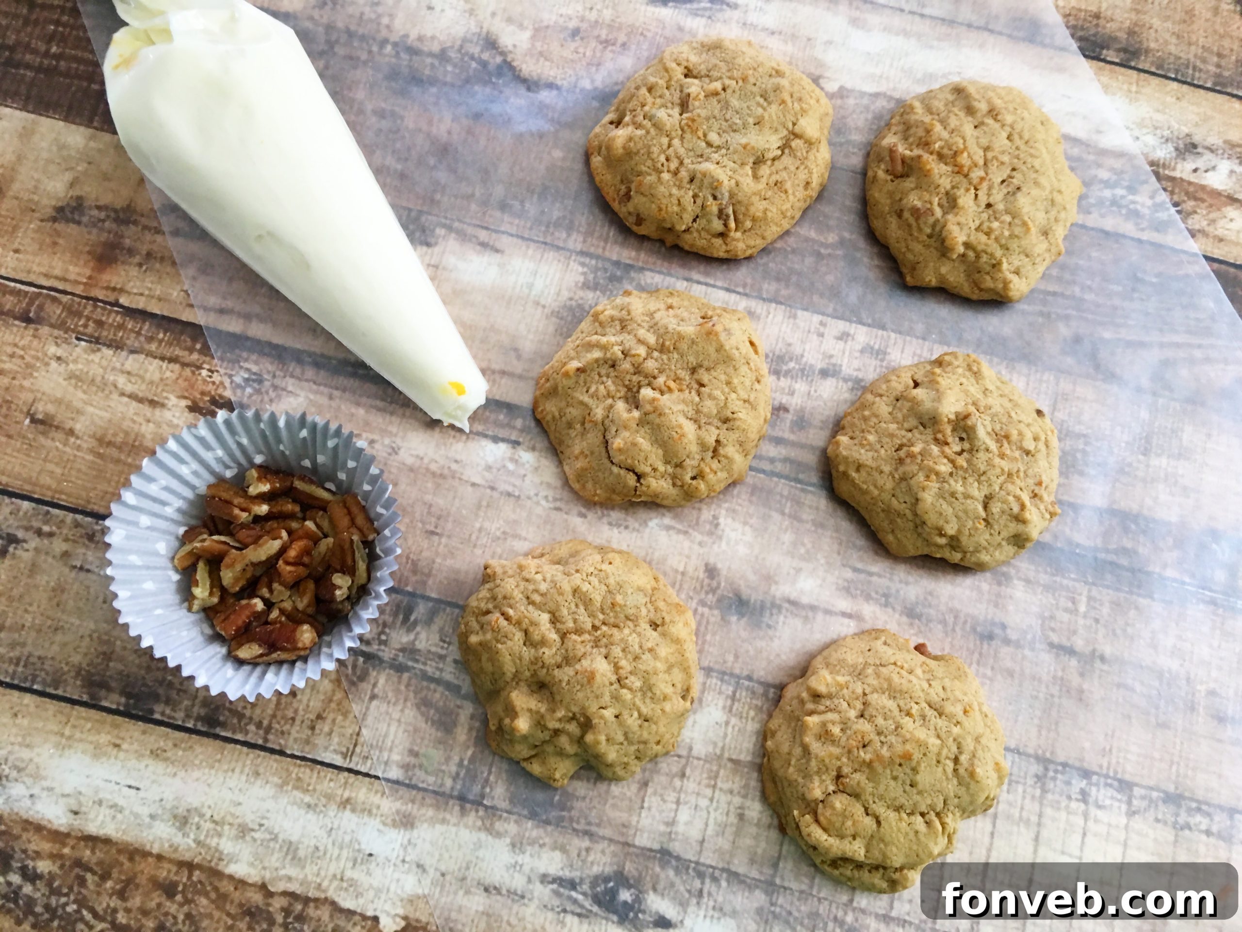 A single carrot cake cookie showing its interior texture and spices