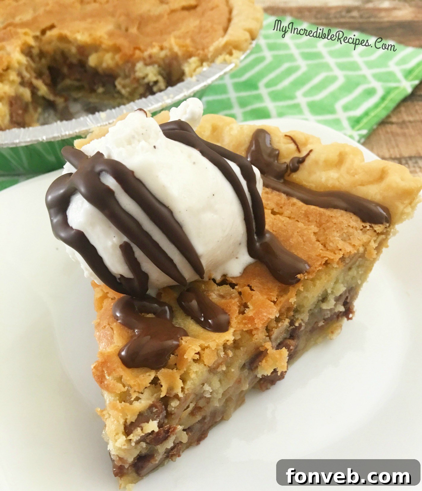 A slice of warm chocolate chip pie ready to be served