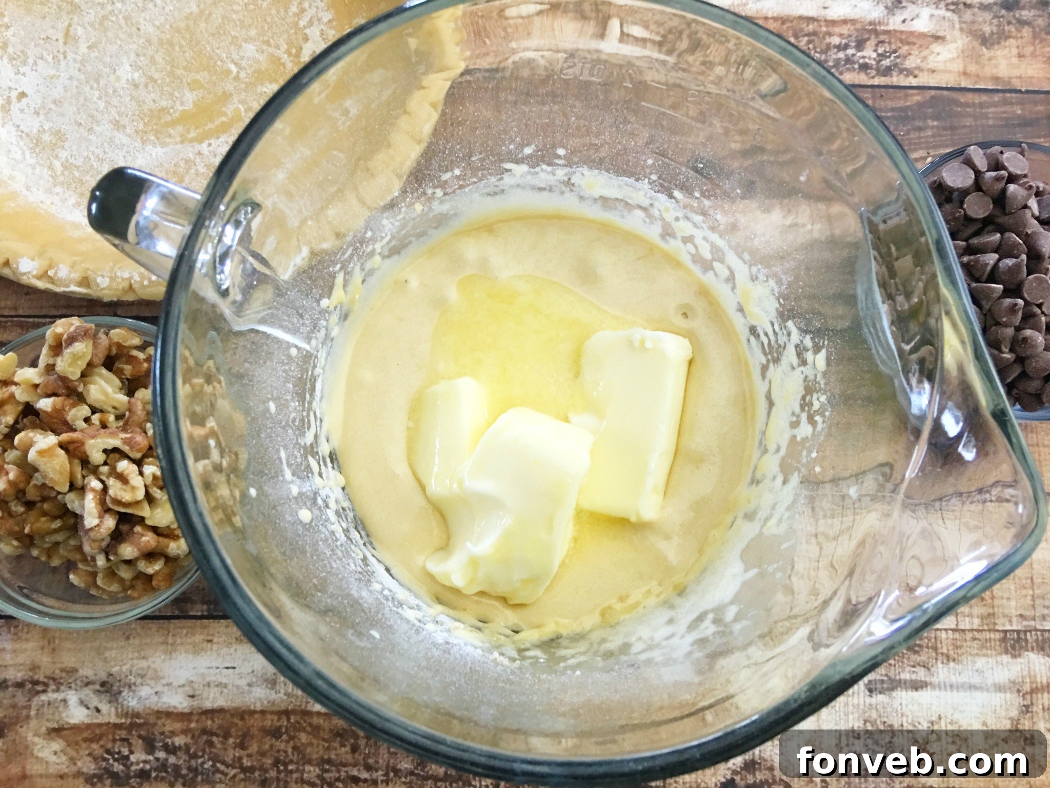 Rich, gooey chocolate chip pie filling with nuts visible