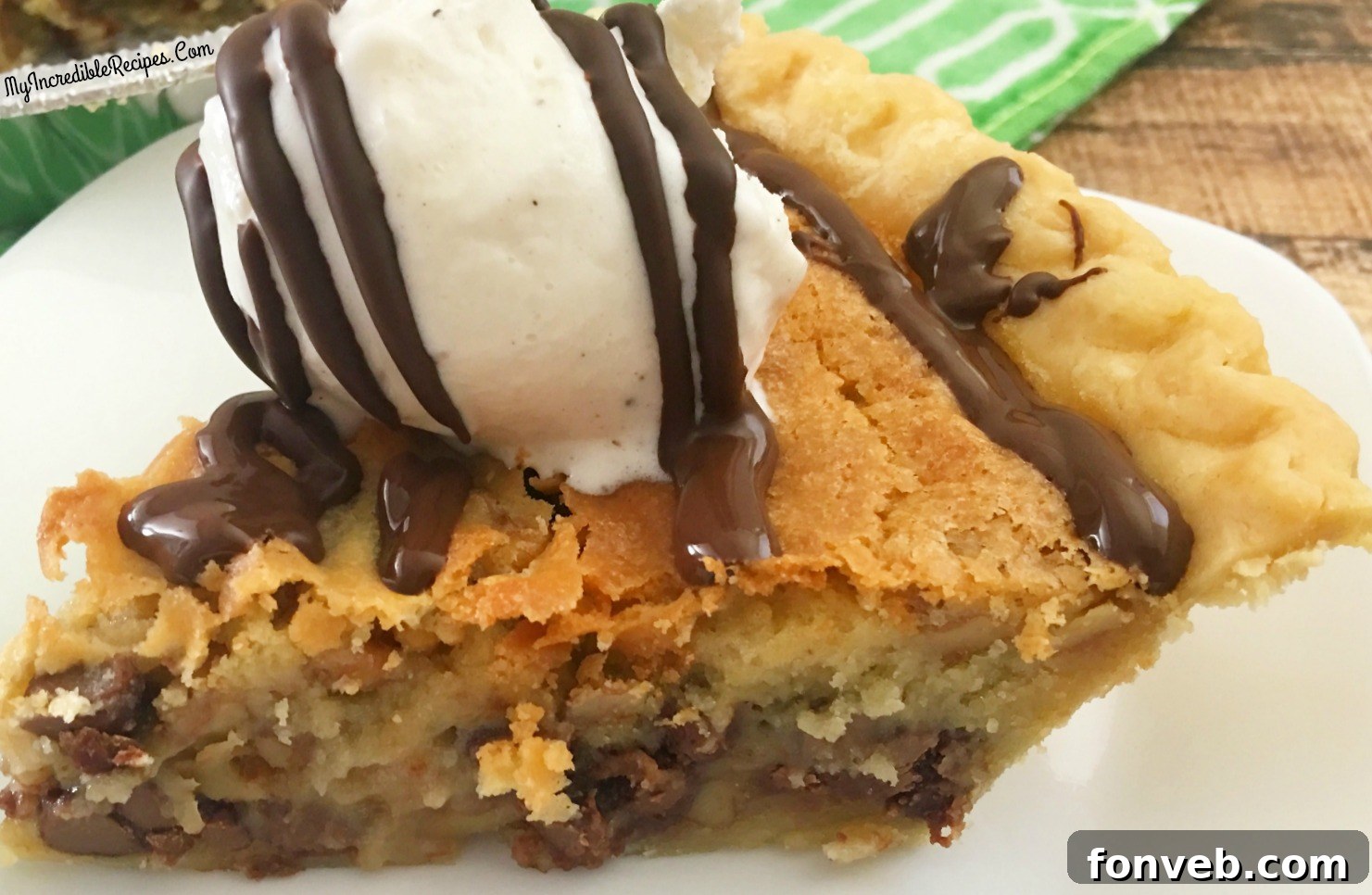 Chocolate chip pie batter with walnuts in a pie shell