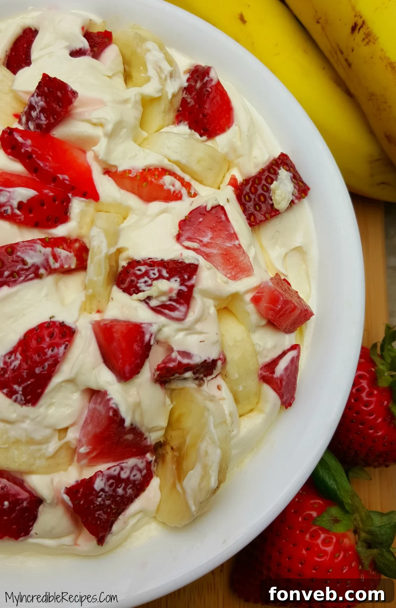 Strawberry Banana Cheesecake Delight 8 An overhead shot of a delightful Strawberry Banana Cheesecake Salad, ready to be enjoyed.