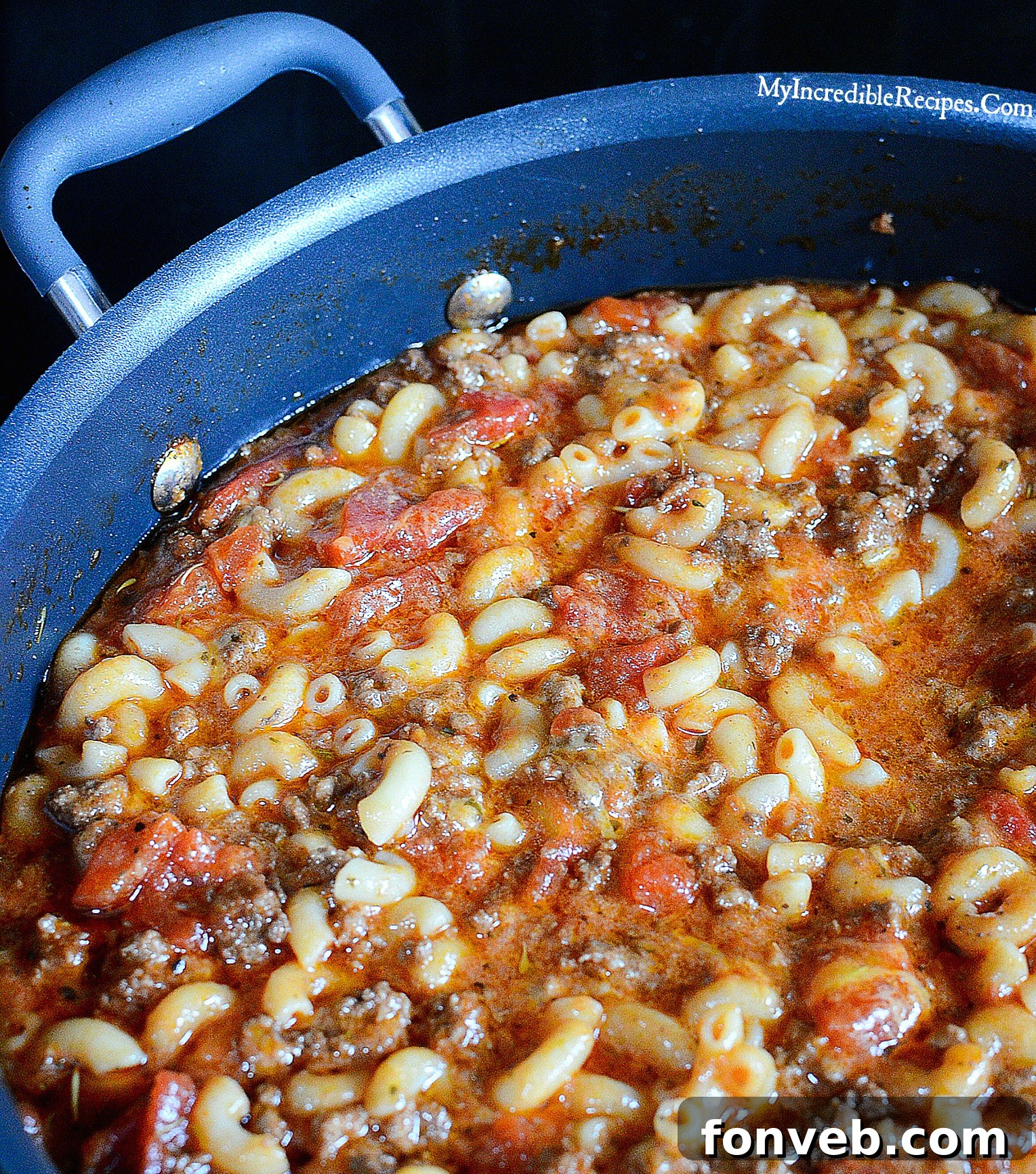 A large pot filled with Old Fashioned Goulash, rich and saucy, ready to be served.