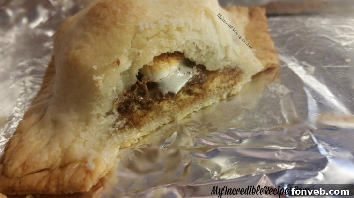 Close-up of a perfectly golden brown s'mores pocket pie
