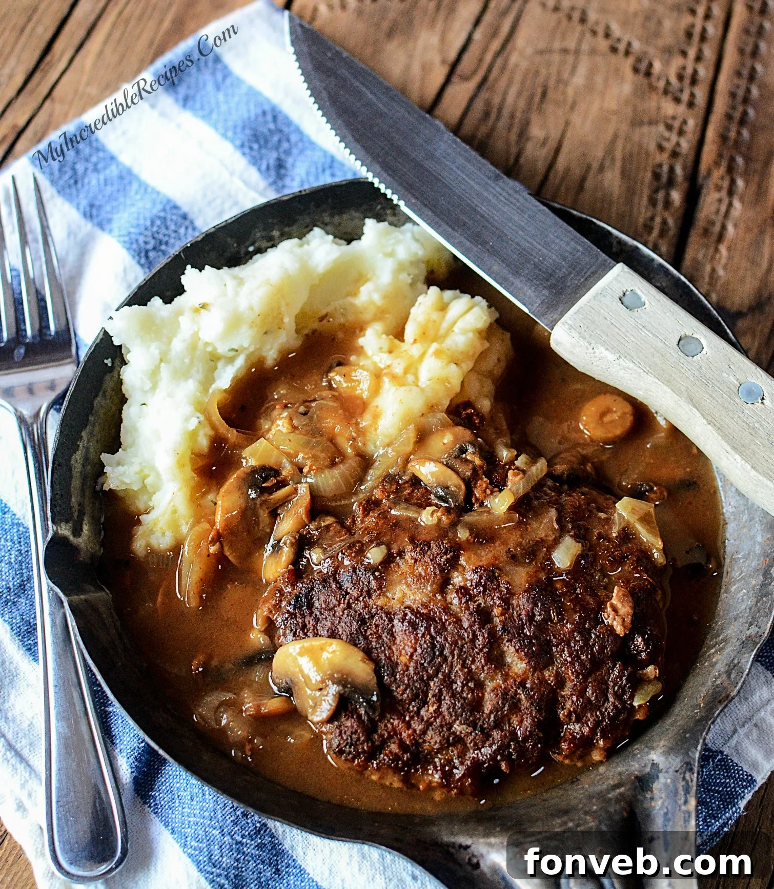 Classic Southern Hamburger Steaks with a side of creamy mashed potatoes.