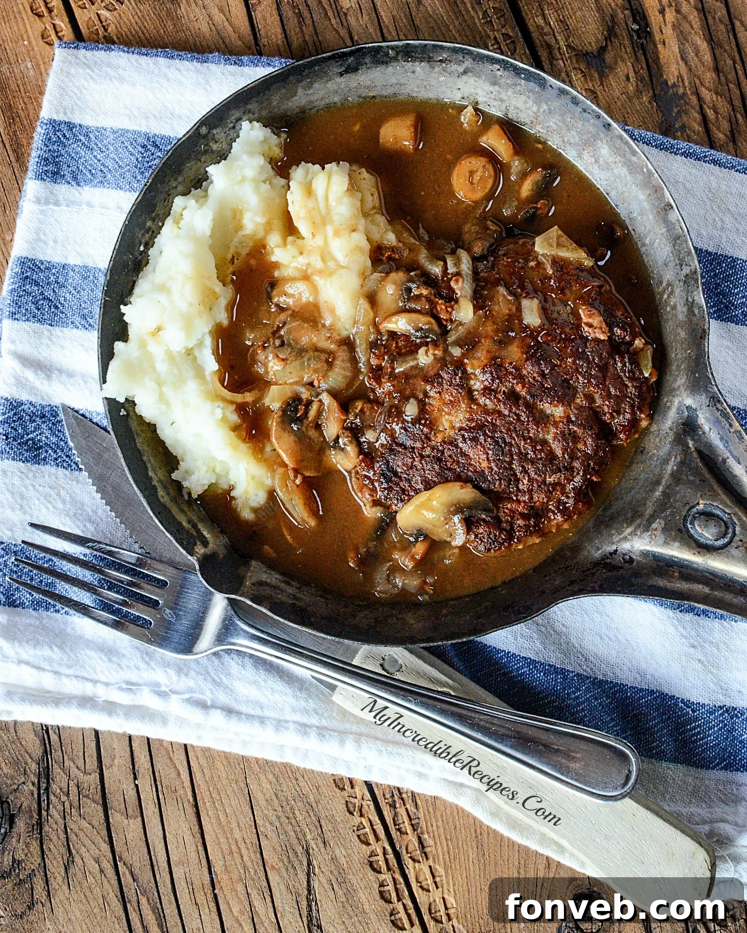 Thick, rich onion mushroom gravy simmering in the pan.