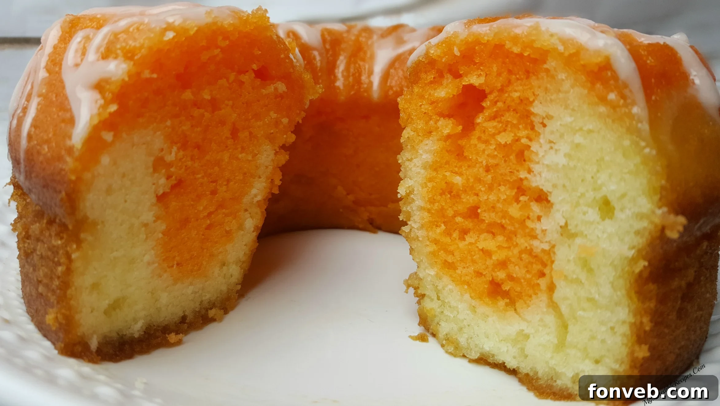 Serving Orange Creamsicle Cake with Vanilla Ice Cream