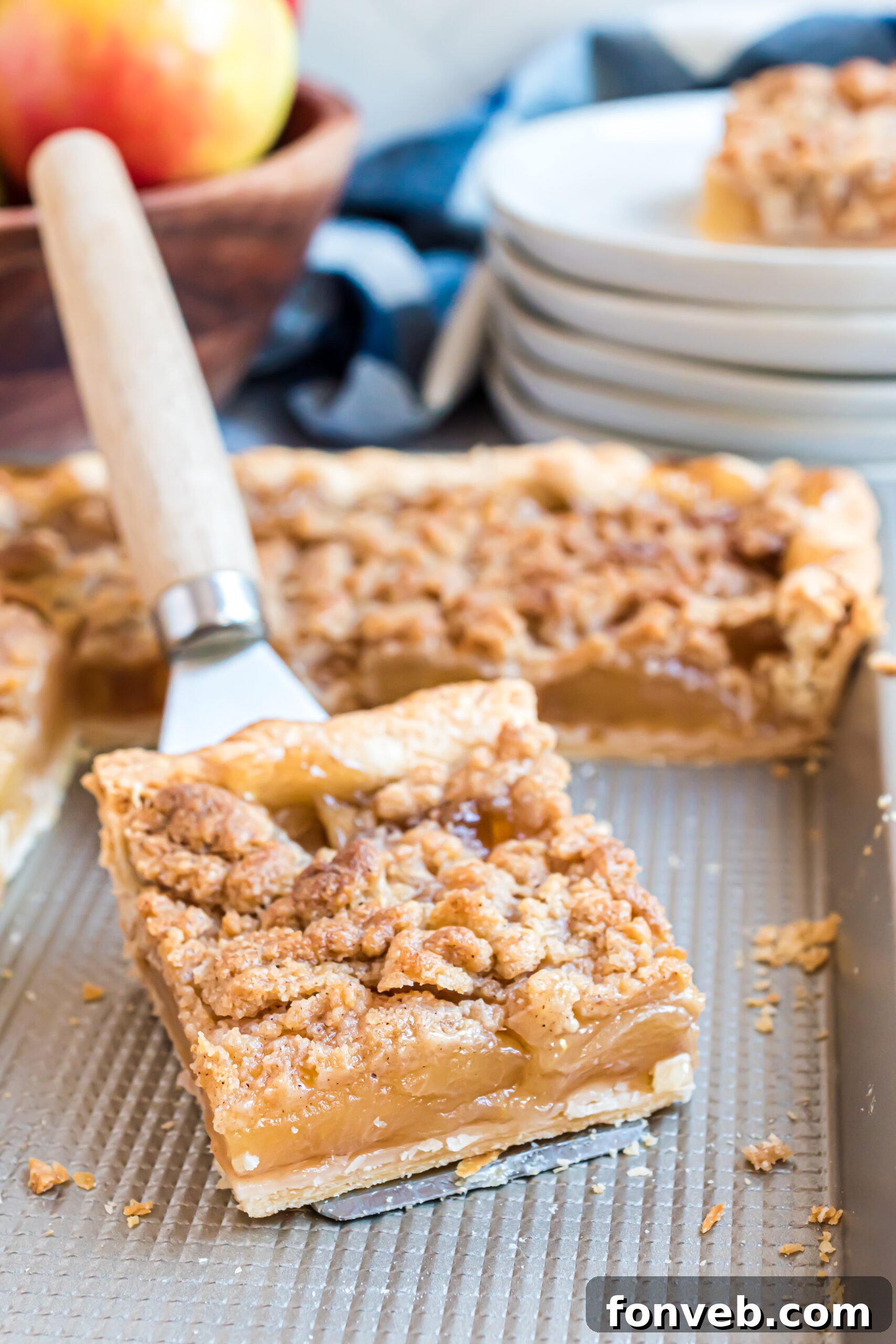 Apple slab pie on a silver baking sheet 