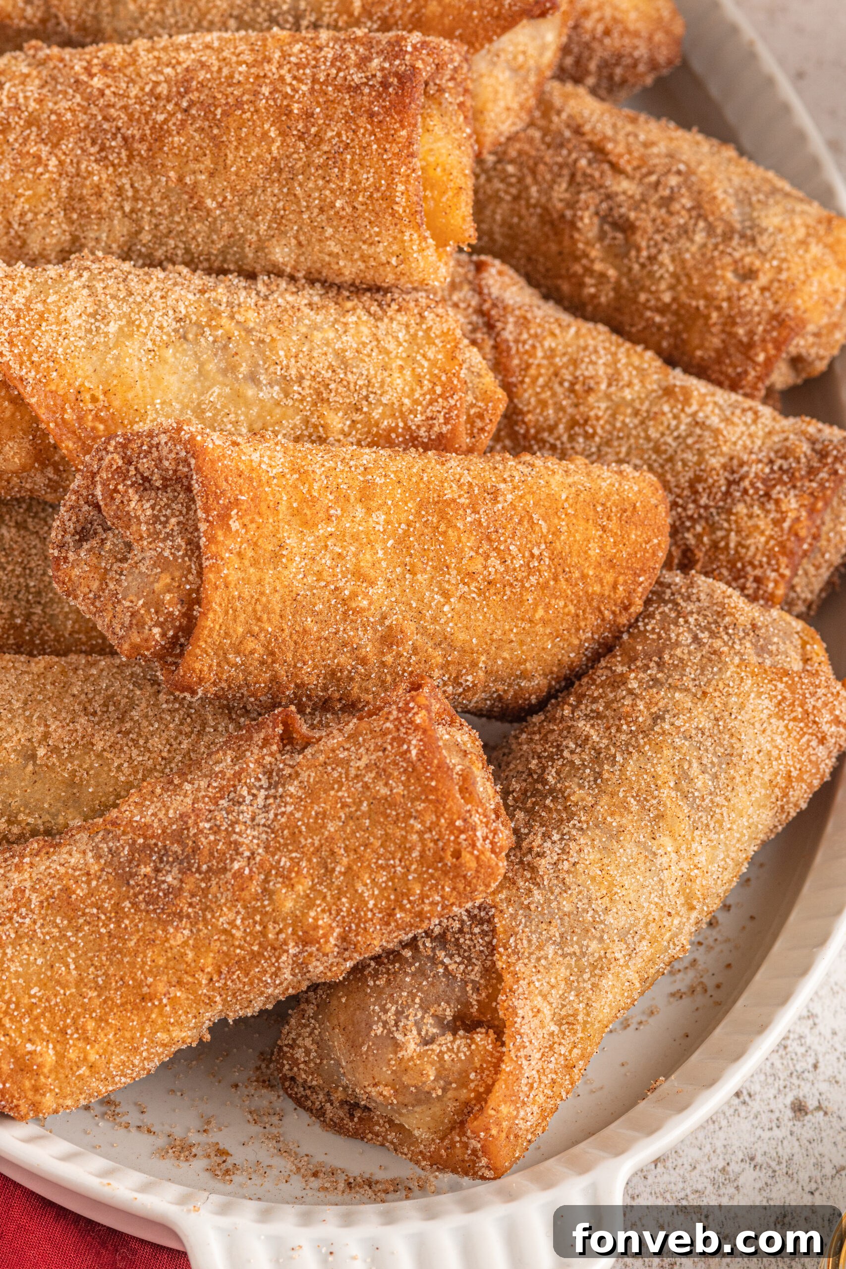 Close up of the cinnamon sugar coating of the dessert egg rolls. 