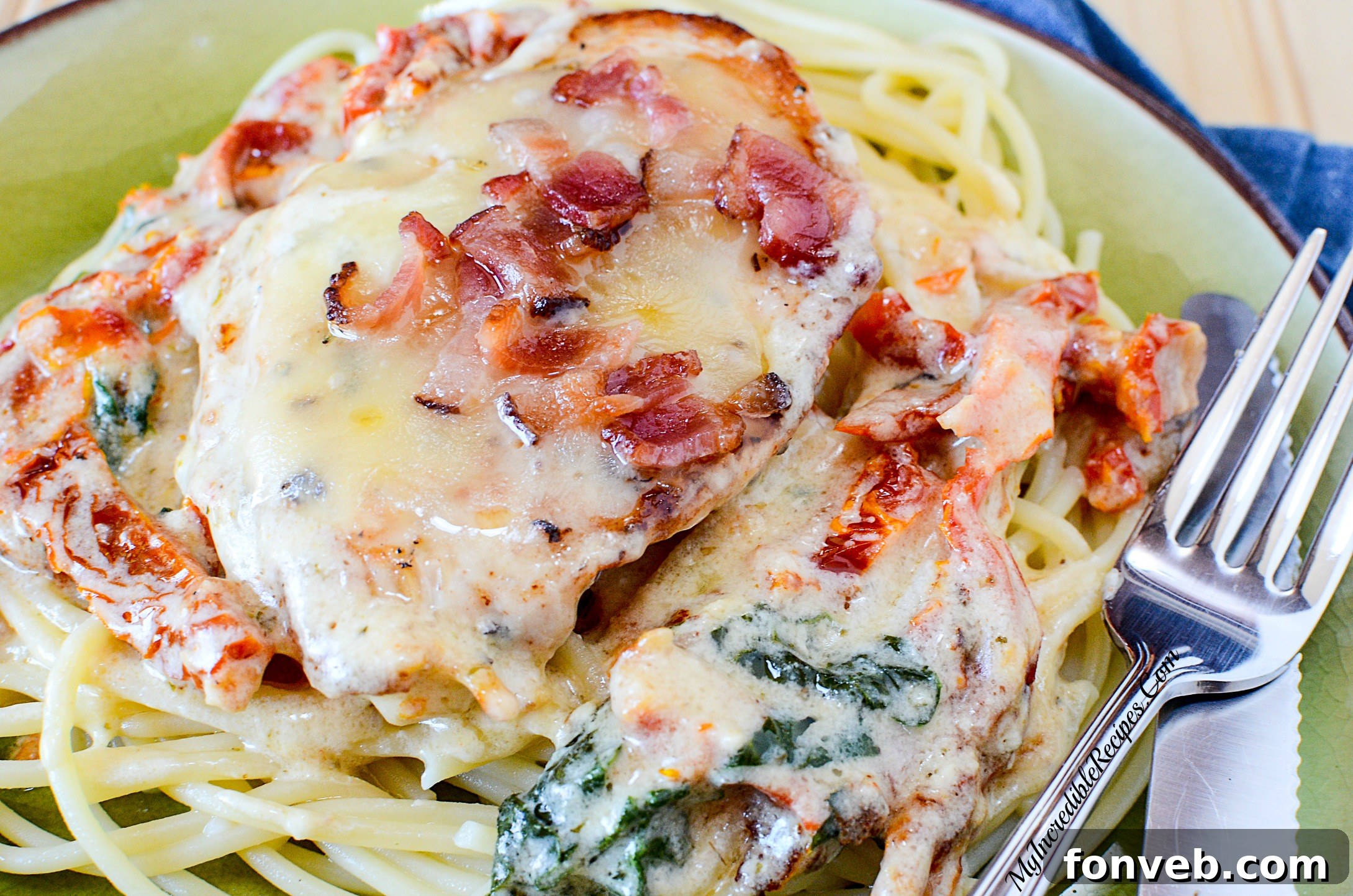 Finished creamy garlic bacon mozzarella chicken dish, covered in sauce and melted cheese