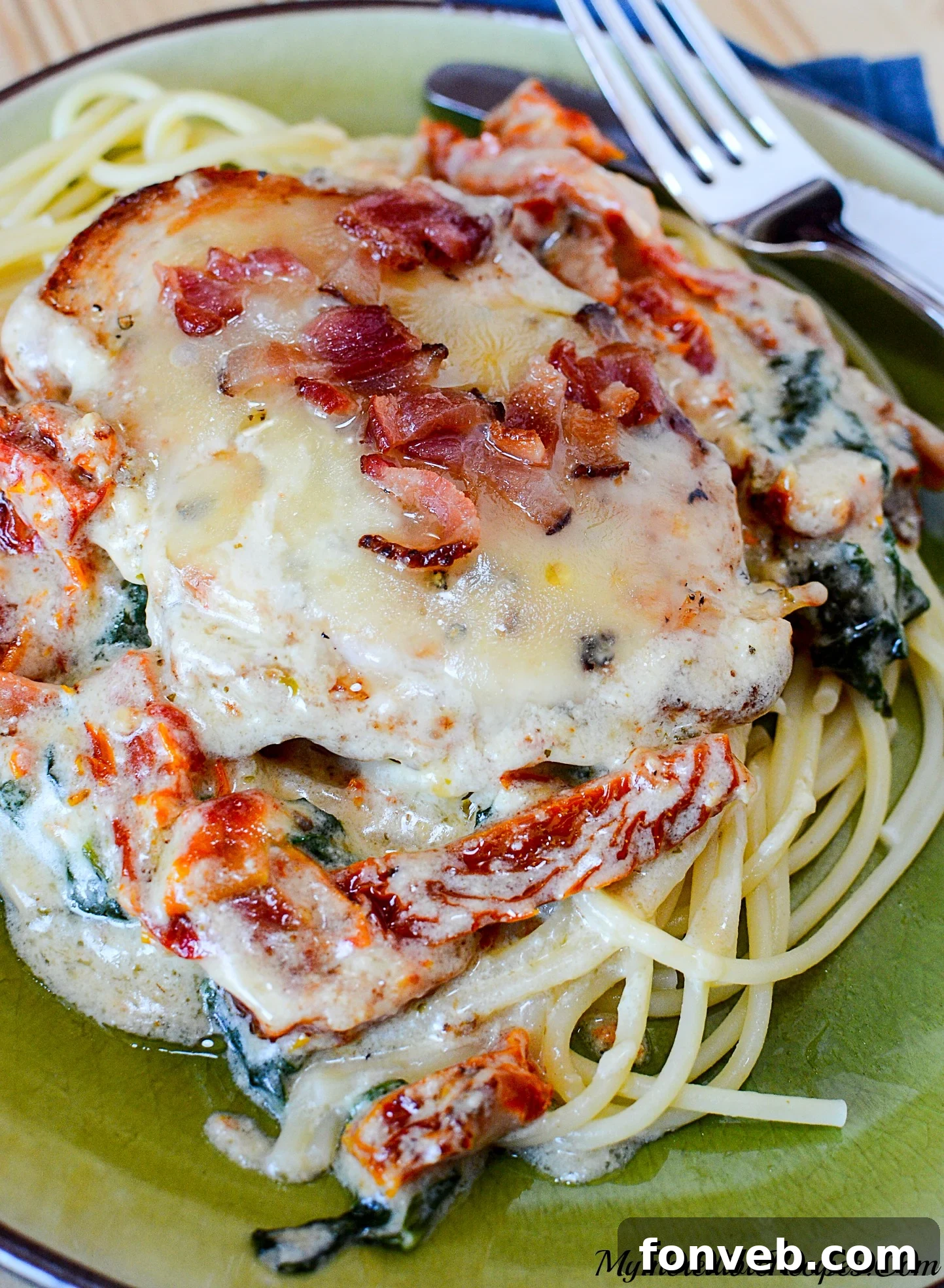 Another mouth-watering close-up view of the creamy chicken dish with herbs