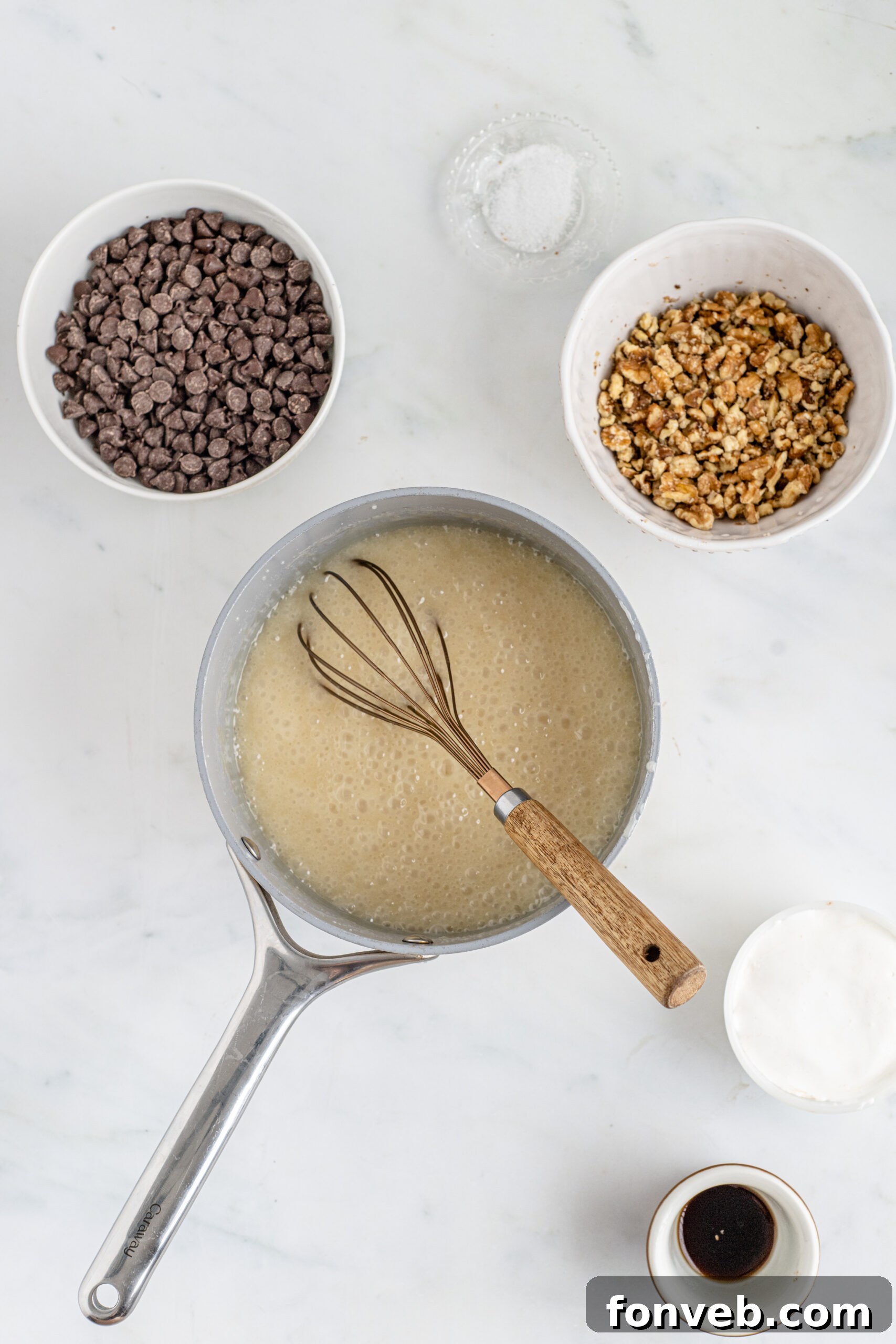 Overhead shot of ingredients melted in saucepan. 