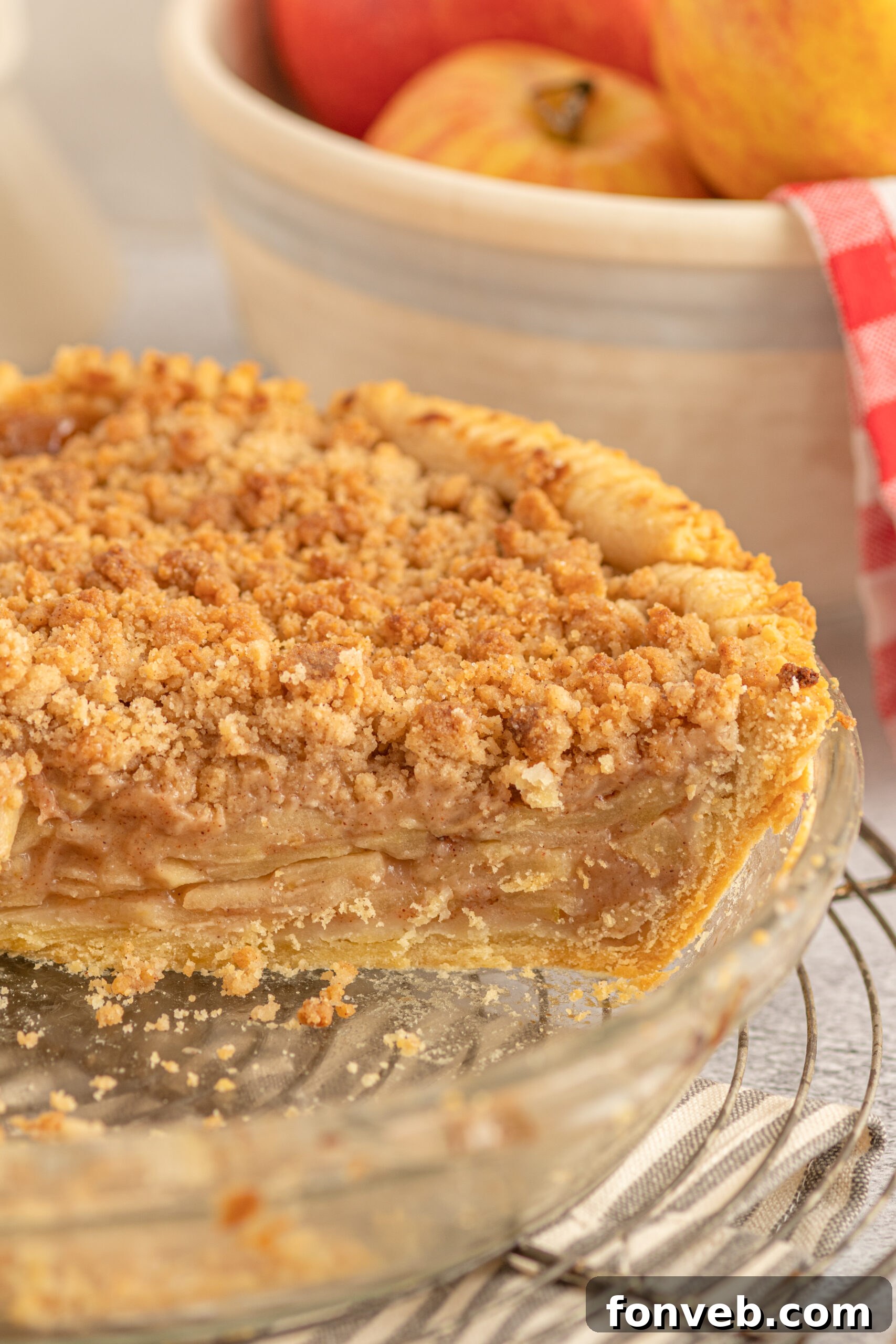 Golden Dutch Apple Crumb Delight 9 A side shot showing the apple layers inside of the Dutch apple pie.