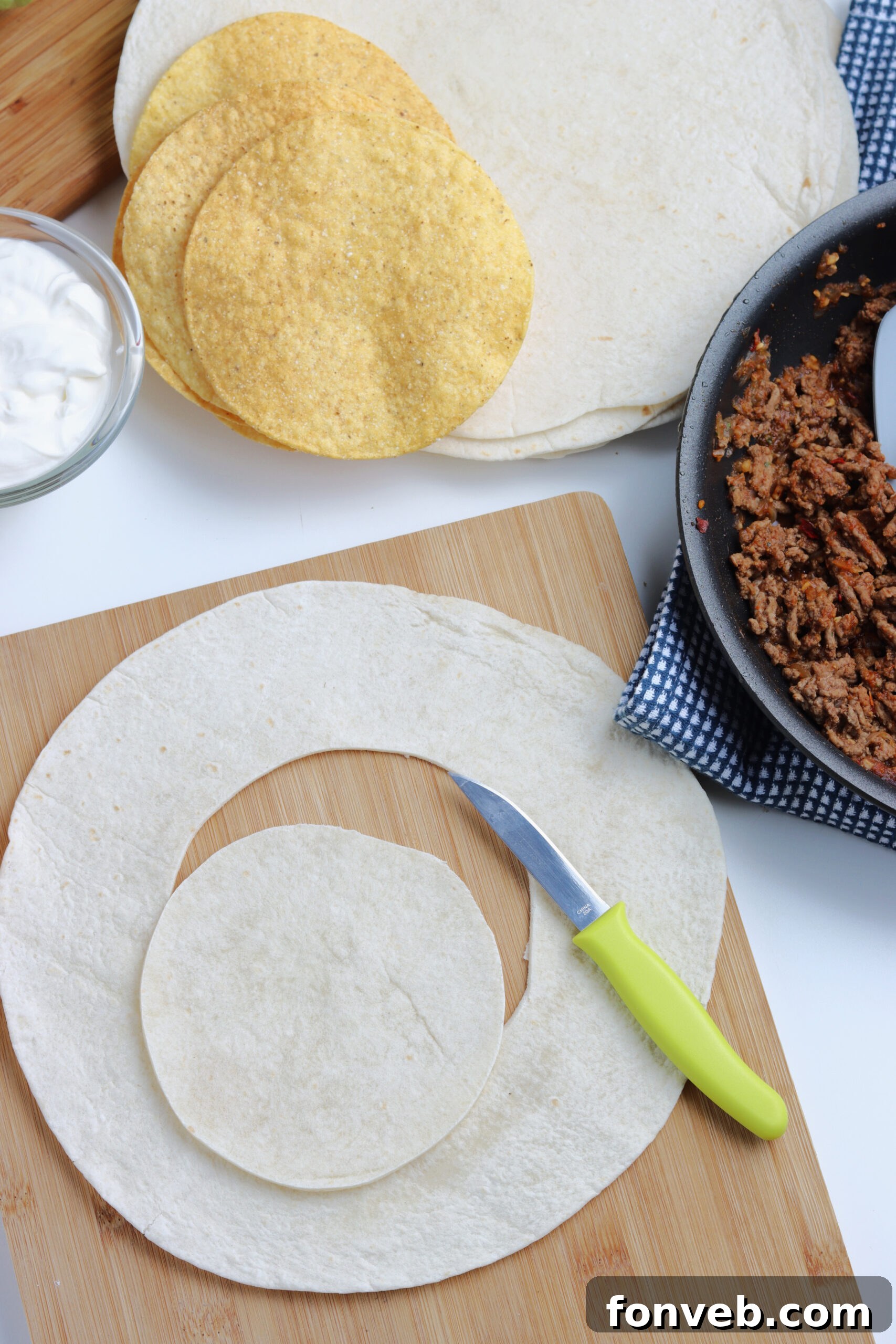Ultimate Crispy Fold 7 A close-up of a skillet cooking the Crunchwrap Supreme to golden perfection.
