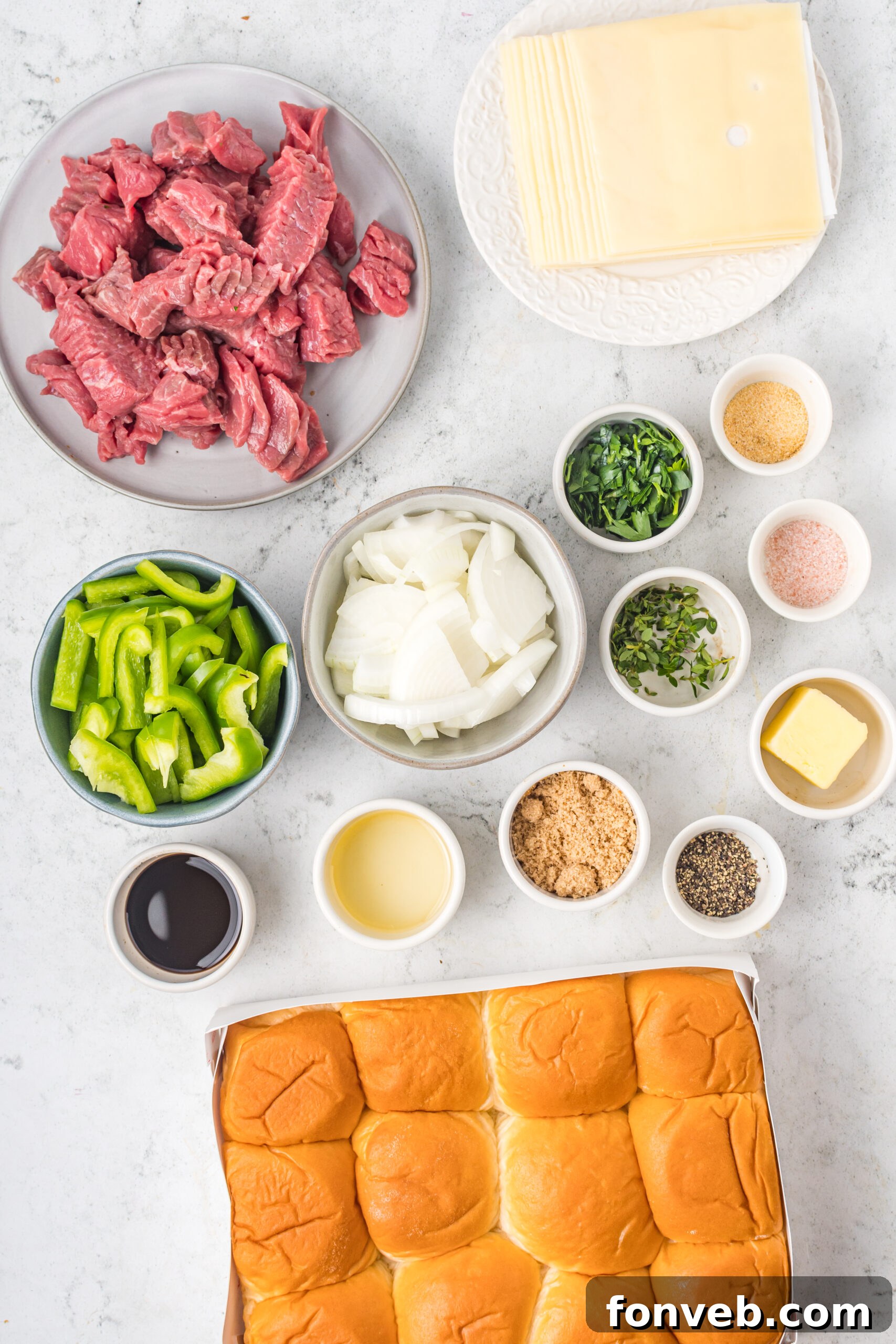 Ultimate Philly Cheesesteak Sliders 6 Overhead shot of ingredients needed to make Philly Cheesesteak Sliders.