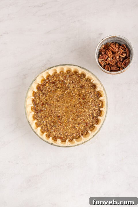 Bourbon Pecan Indulgence 12 Bourbon Pecan Pie baking in the oven