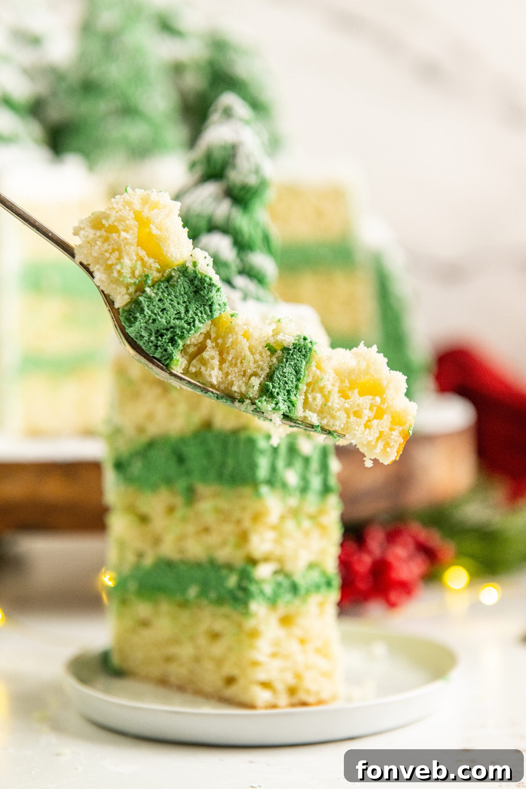 A close up shot of a bite of the Christmas Tree Cake. 