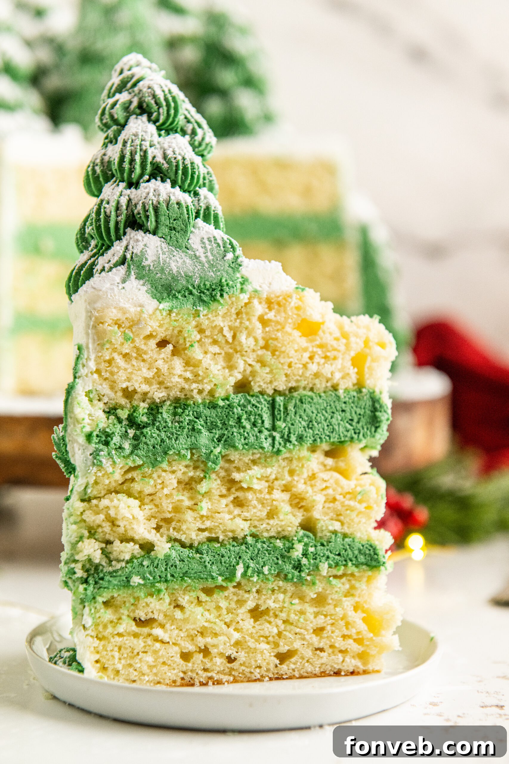 Christmas Tree cake slice on a white plate