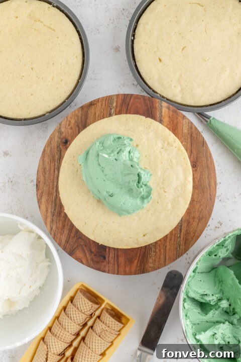 Sugar cones being frosted to create Christmas trees.