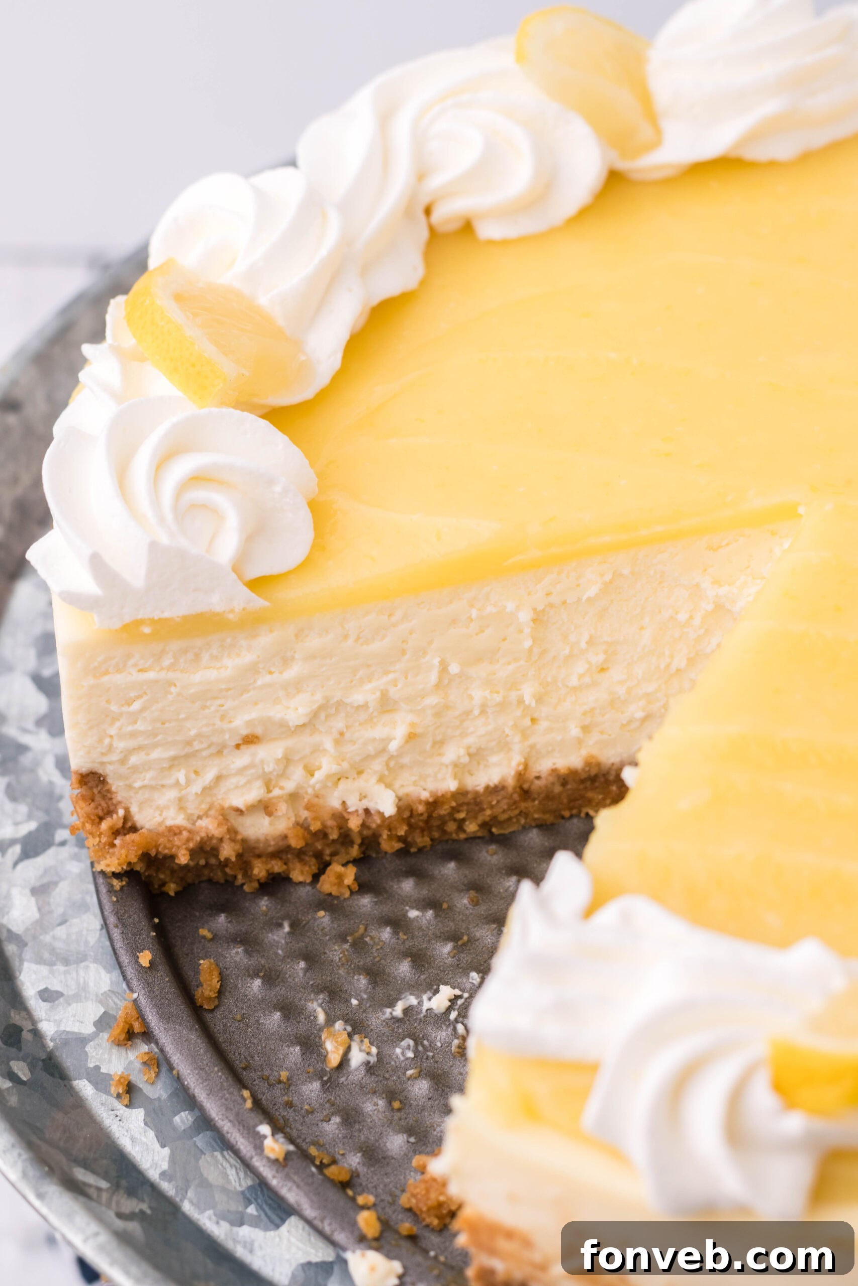 A photo showing the creamy inside of the Lemon Curd Cheesecake.