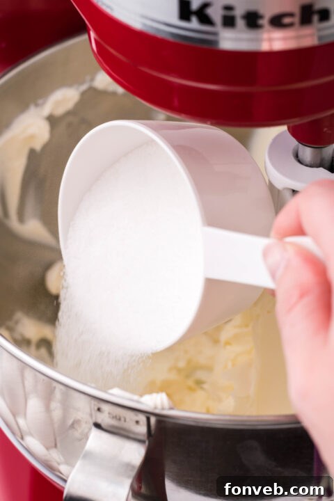 Full Lemon Curd Cheesecake garnished with lemon slices.