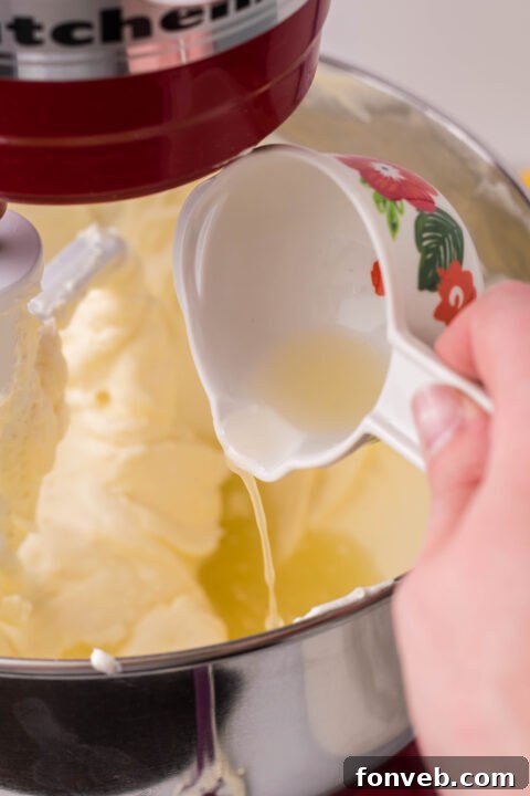 Lemon Curd Cheesecake being prepped for serving.