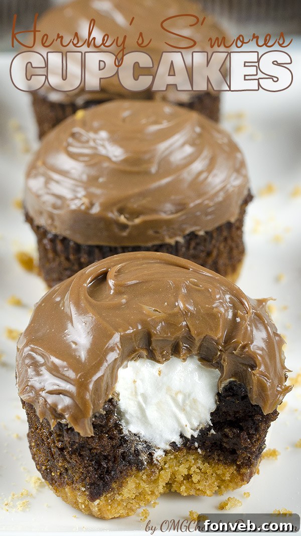 Irresistible Hershey's S'mores Cupcakes topped with toasted marshmallow and chocolate