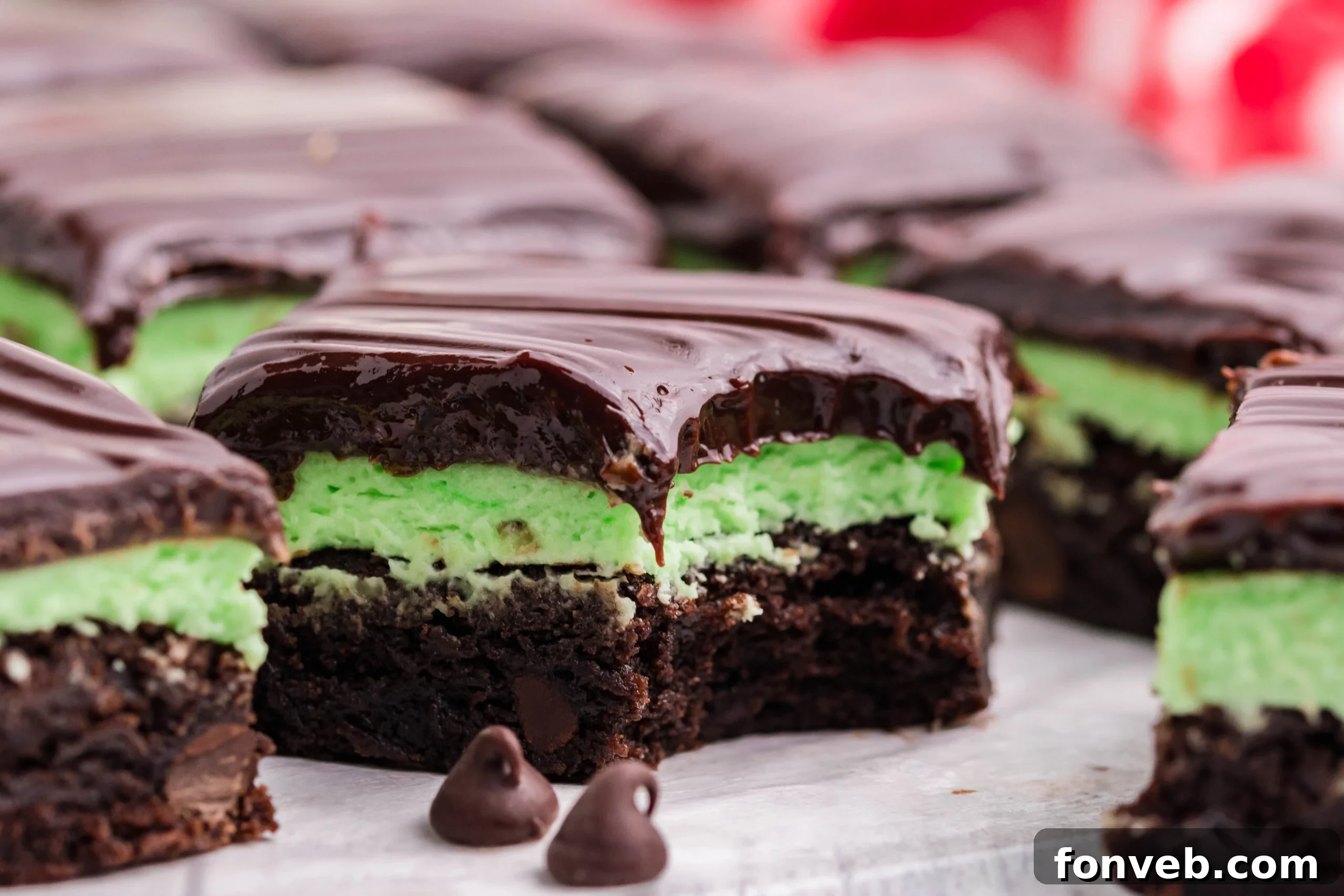 Up close view of a bite removed from the chocolate mint brownies.