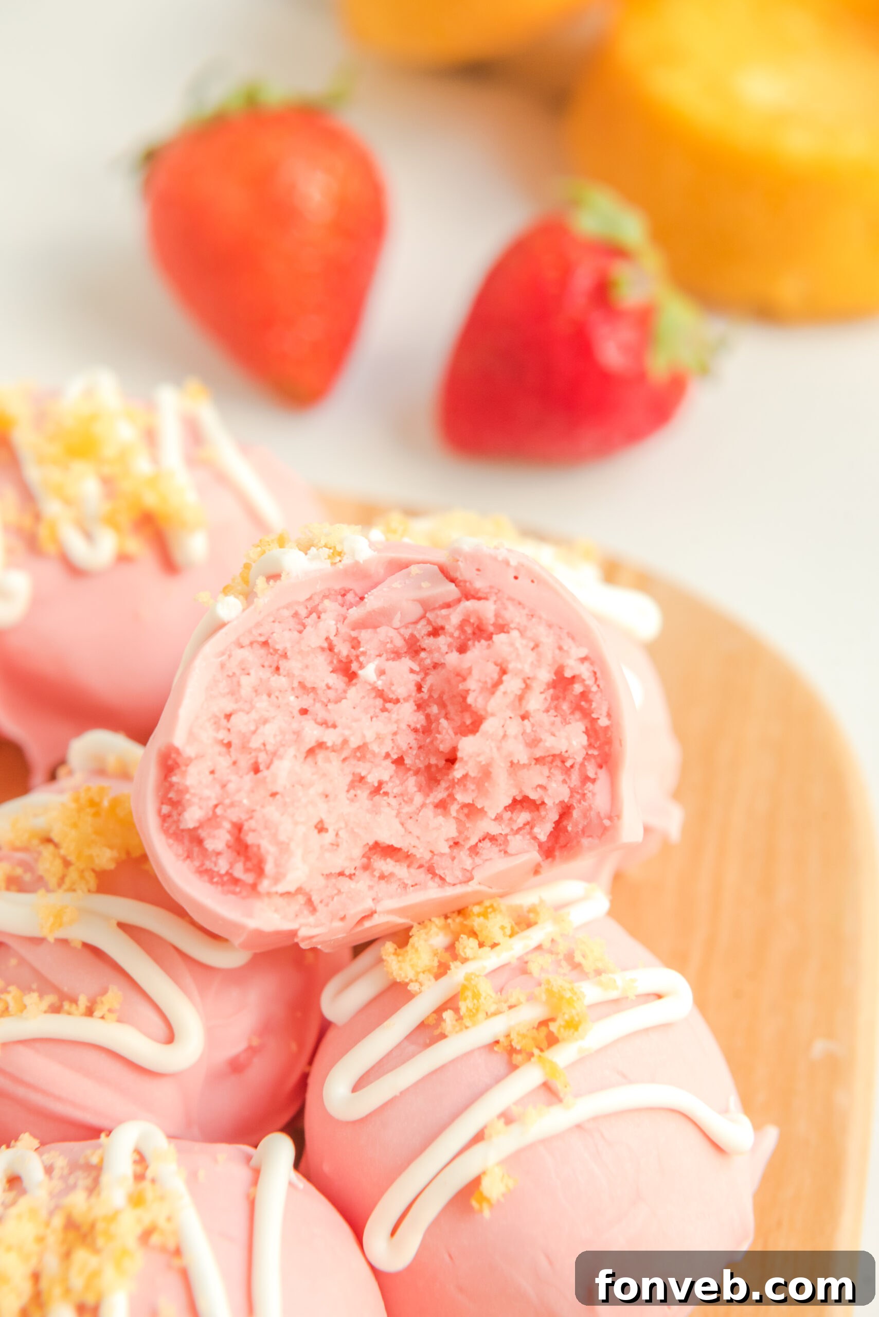 Close up of the center of a strawberry truffle.
