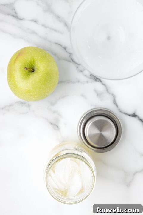 Shaking the cocktail ingredients with ice.