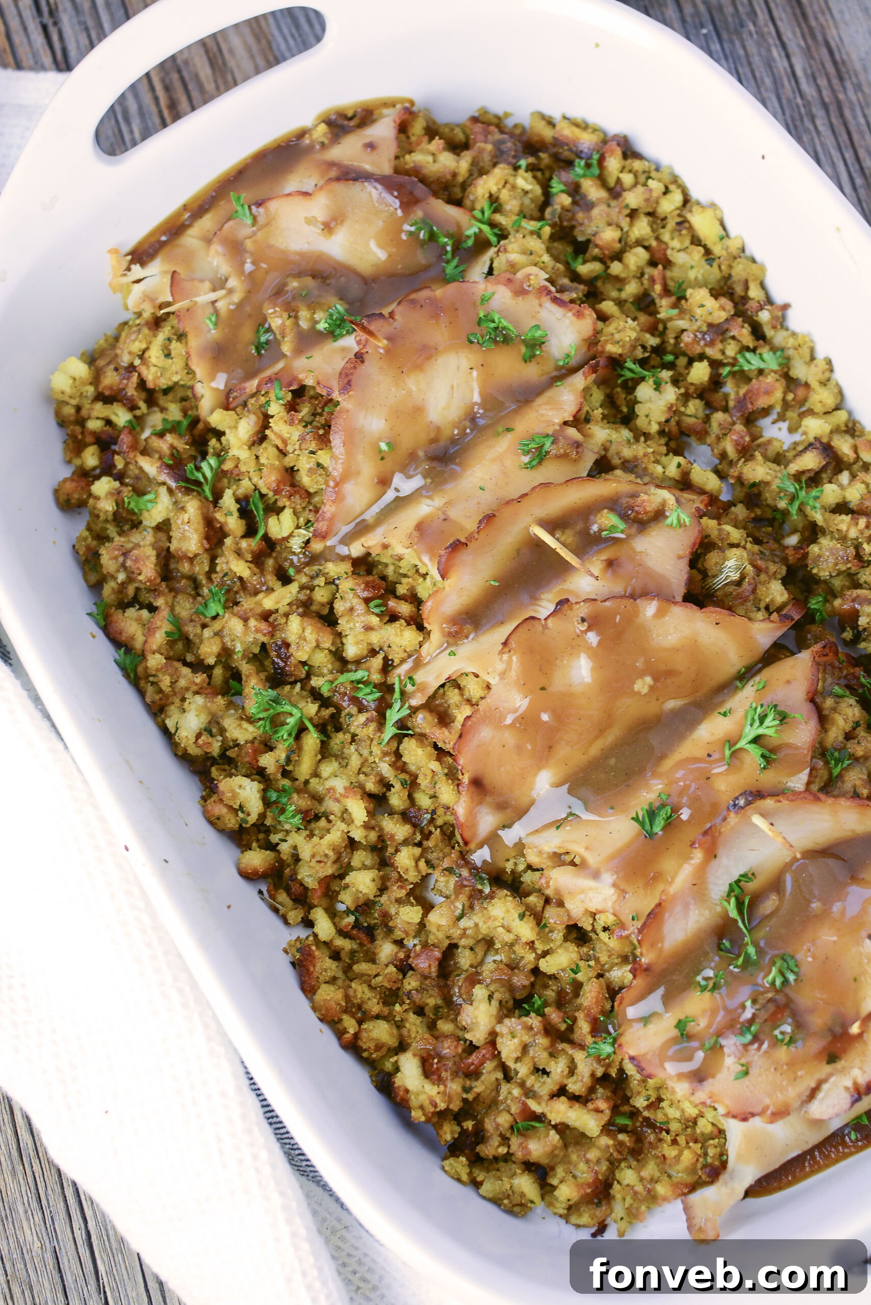Overhead view of Turkey Stuffing Rolls in a white baking dish. 
